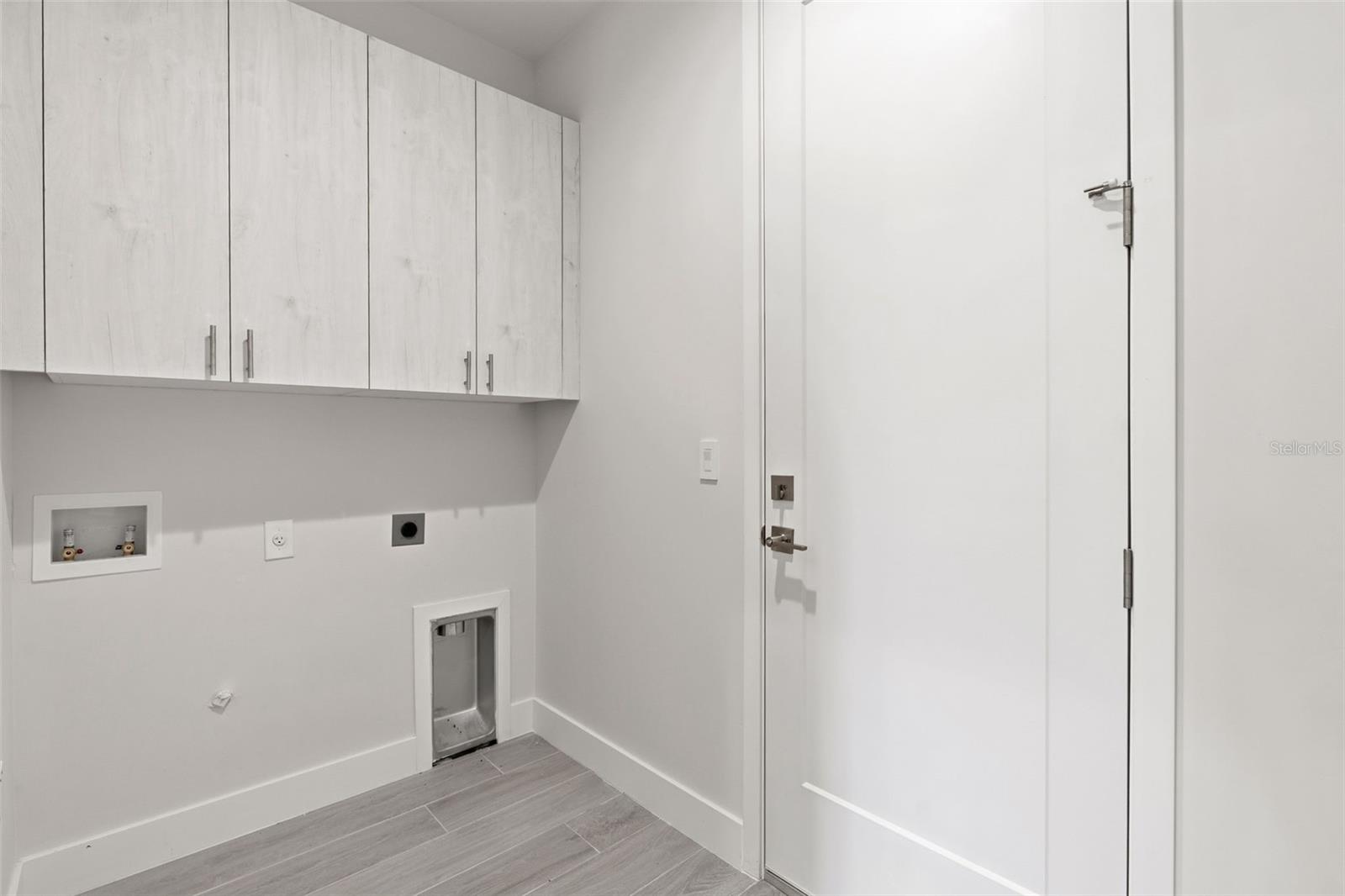 Inside Laundry Room with Extra Cabinetry - 14319 ALLENSWORTH AVE, PORT CHARLOTTE
