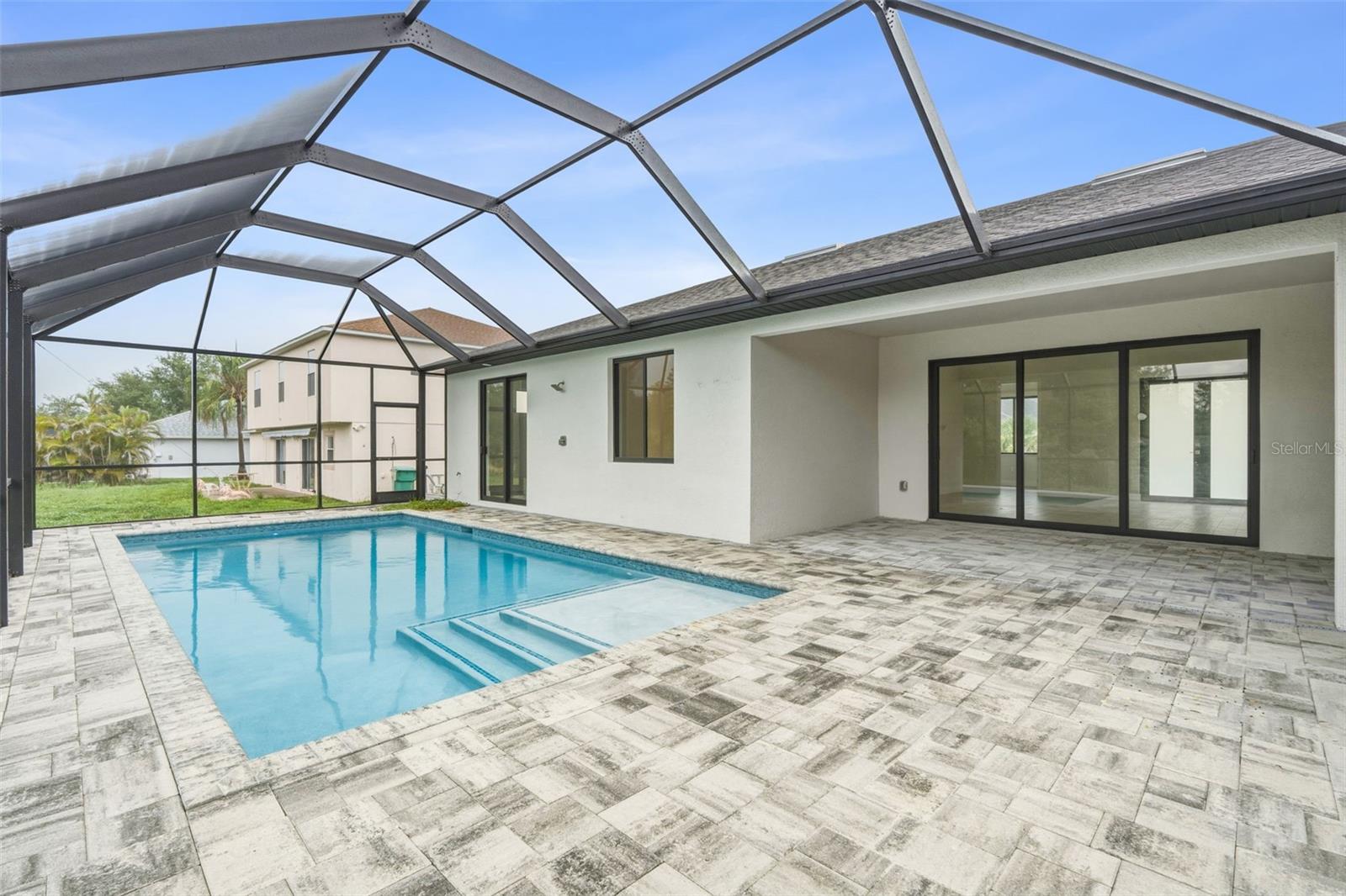 Resort Style Pool area with Space for Entertaining - 14319 ALLENSWORTH AVE, PORT CHARLOTTE