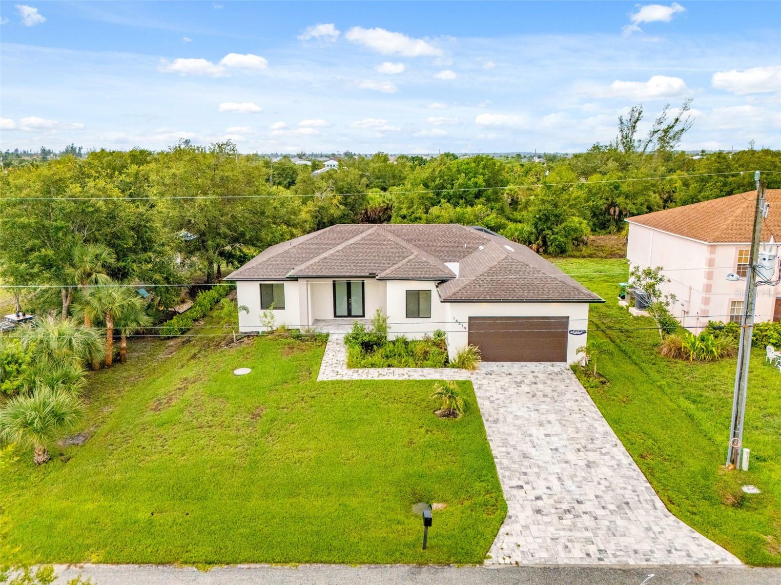 Sleek 2025 New Build with Modern Curb Appeal - 14319 ALLENSWORTH AVE, PORT CHARLOTTE