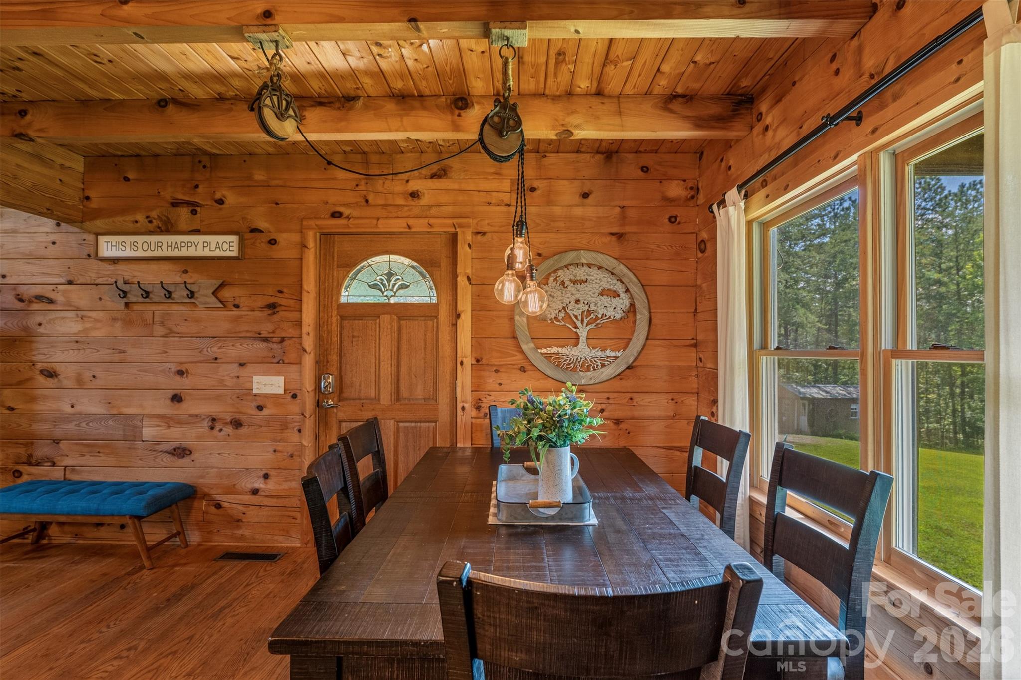 View from kitchen of side porch entrance. - 4551 Lake Adger Parkway, Mill Spring