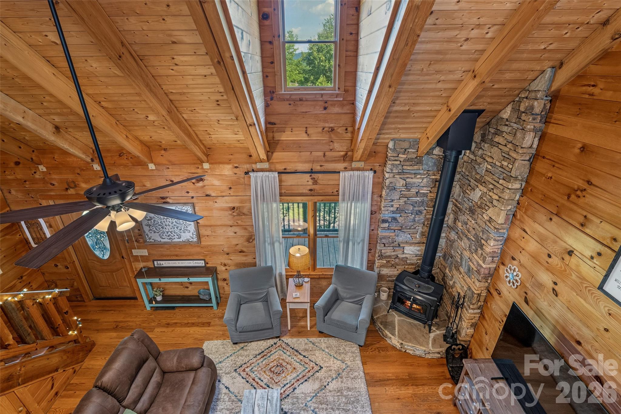 View from loft and distant mountain through dormer - 4551 Lake Adger Parkway, Mill Spring