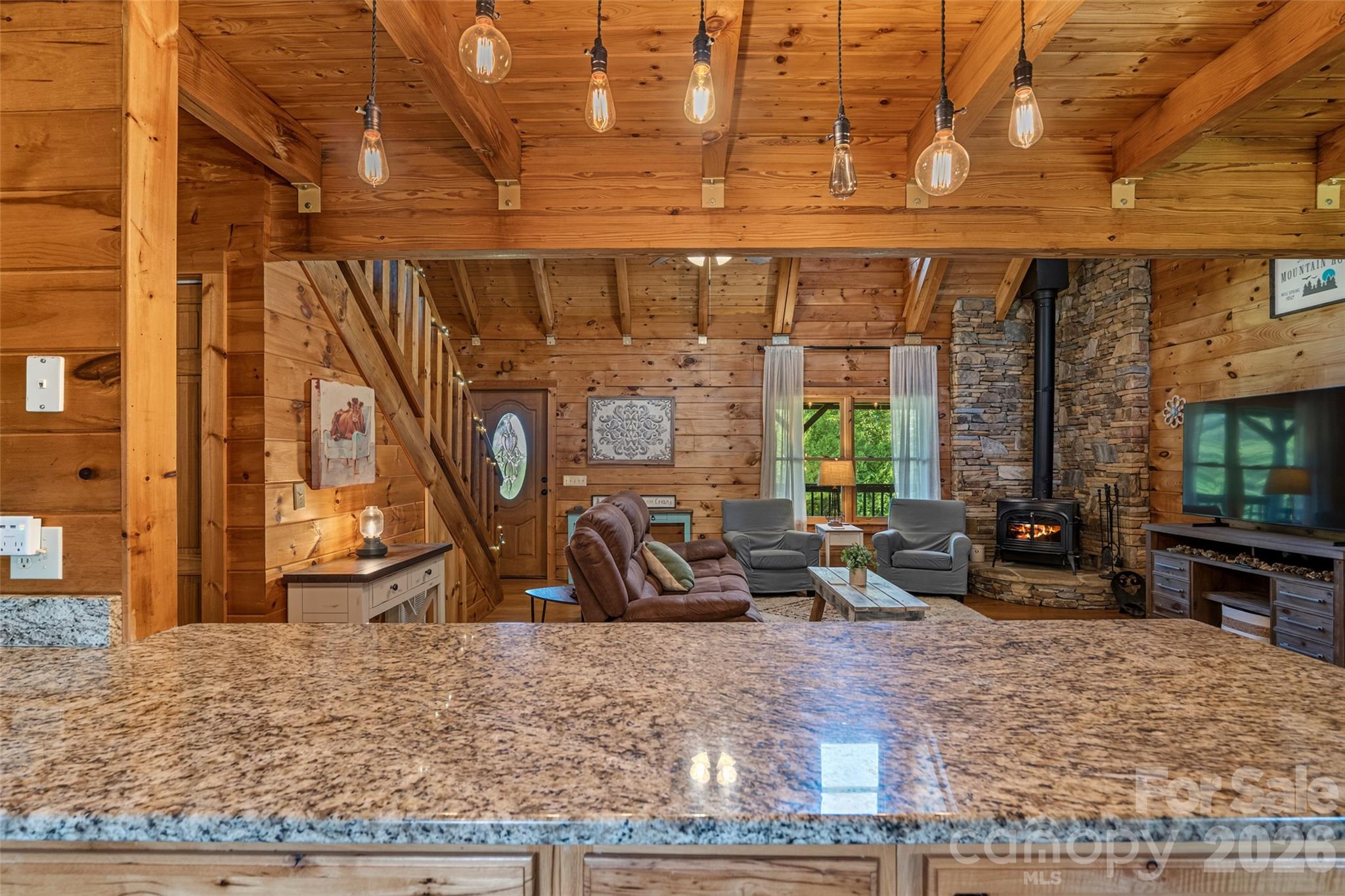 Beautiful granite countertops in kitchen. - 4551 Lake Adger Parkway, Mill Spring