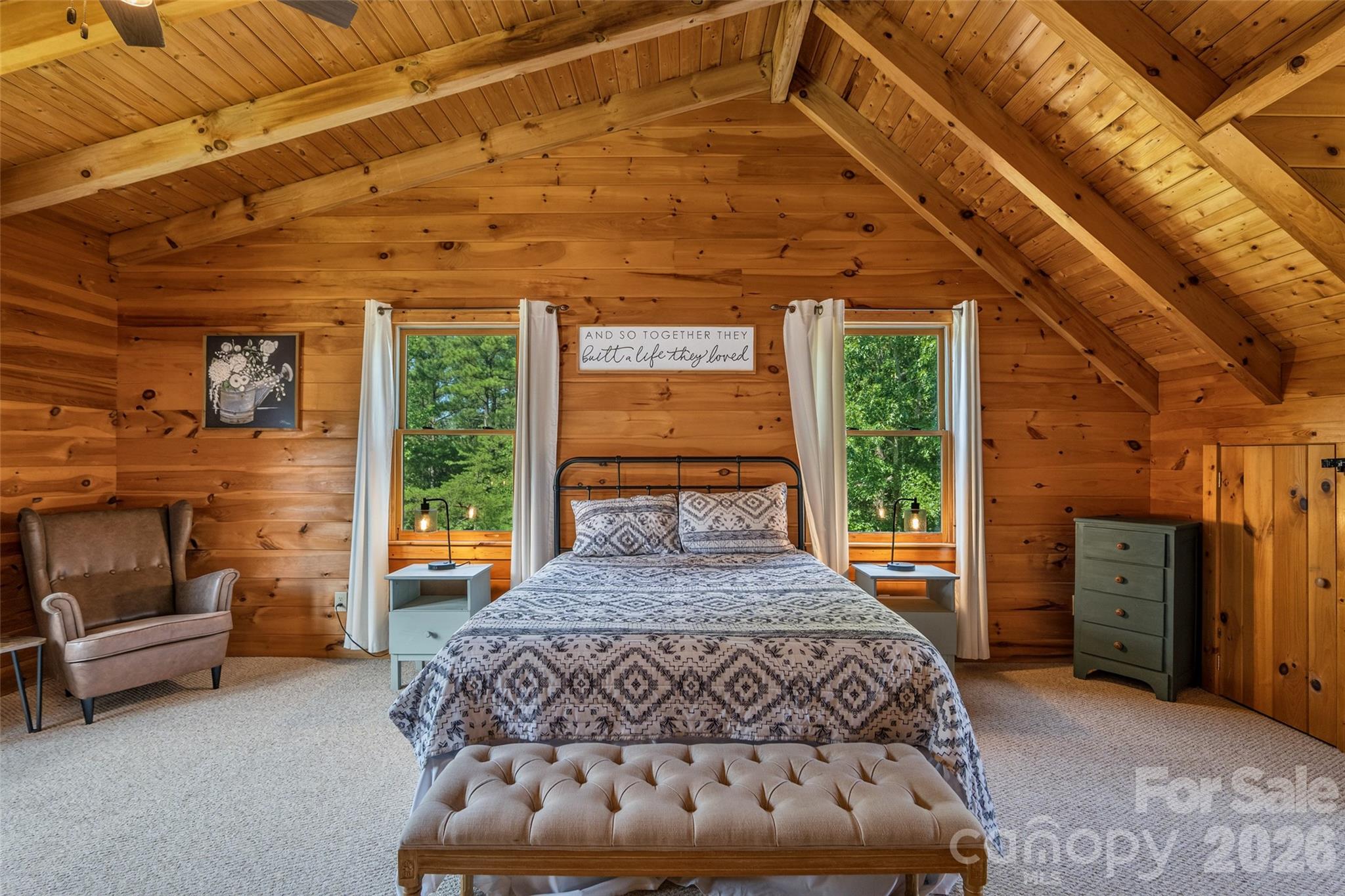 Primary bedroom has ample living space and vaulted ceiling. - 4551 Lake Adger Parkway, Mill Spring