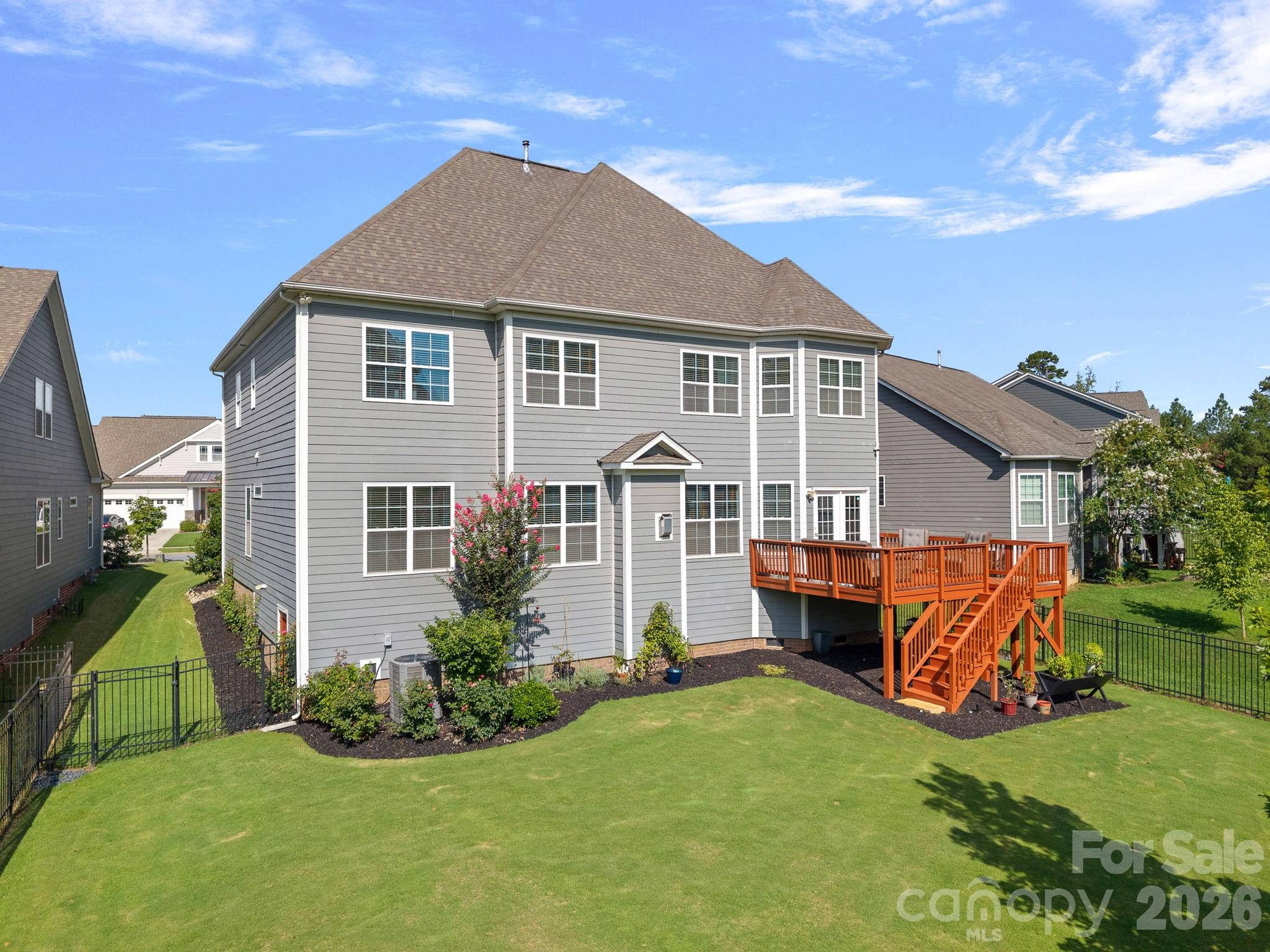 Rear elevation with a tall crawl space with vapor barrier - 13147 Union Square Drive, Huntersville
