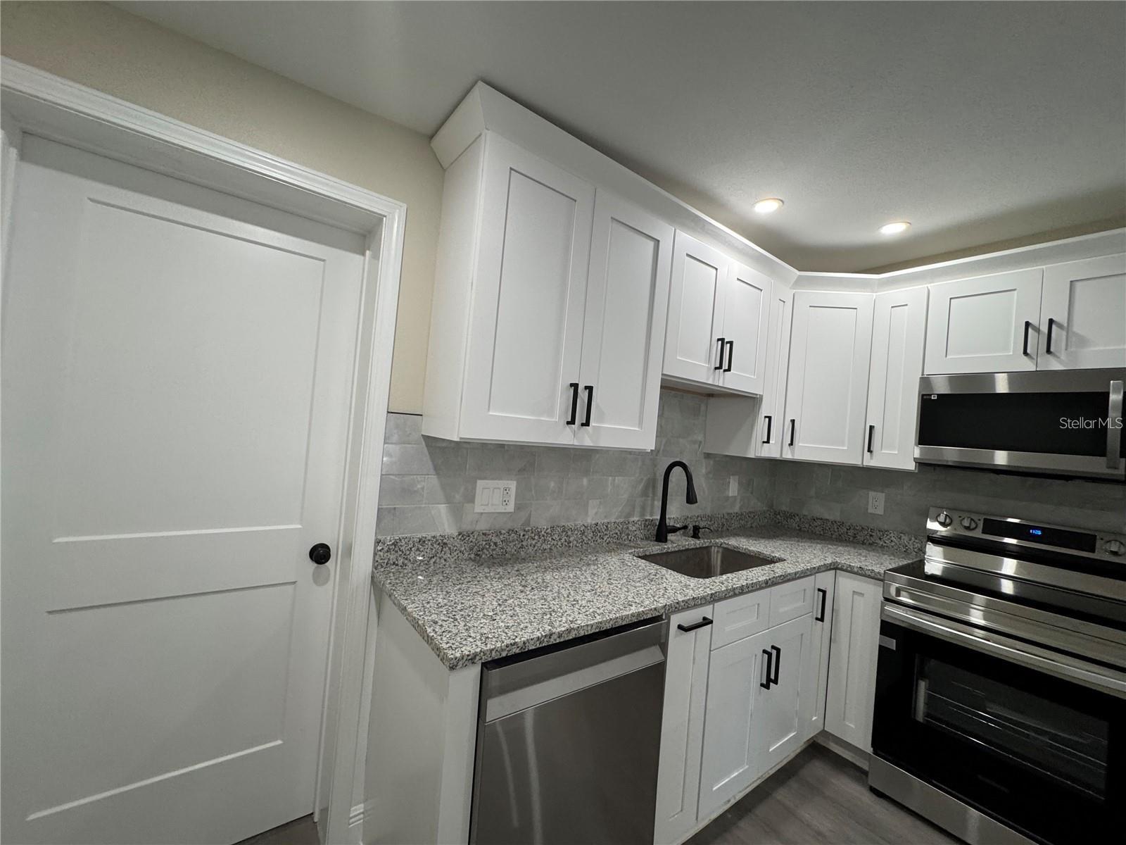 Single Family Residence at 7039 LENOX DR, NEW PORT RICHEY, photo 7 of 25