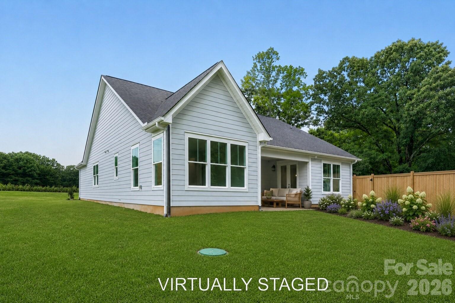 VIRTUALLY STAGED ADDED FENCE AND LANDSCAPING FOR EXAMPLE - 2358 Fay Jones Road, Denver