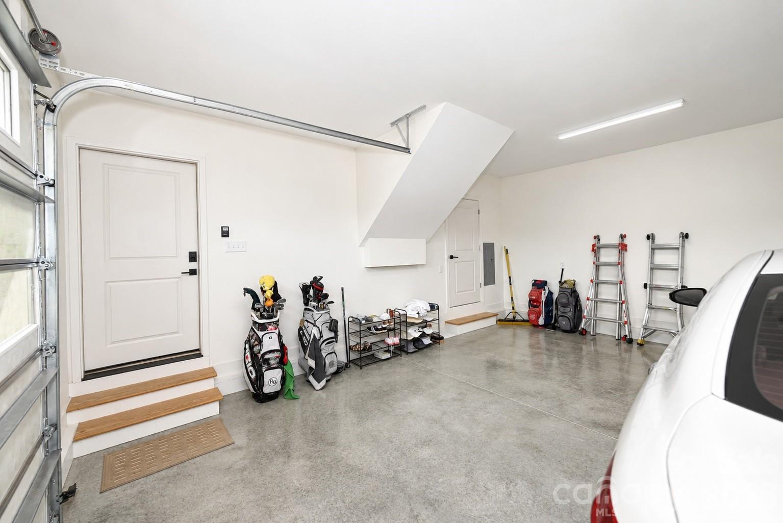 2 car garage with a storage room - 3793 Sarazen Court NE, Conover