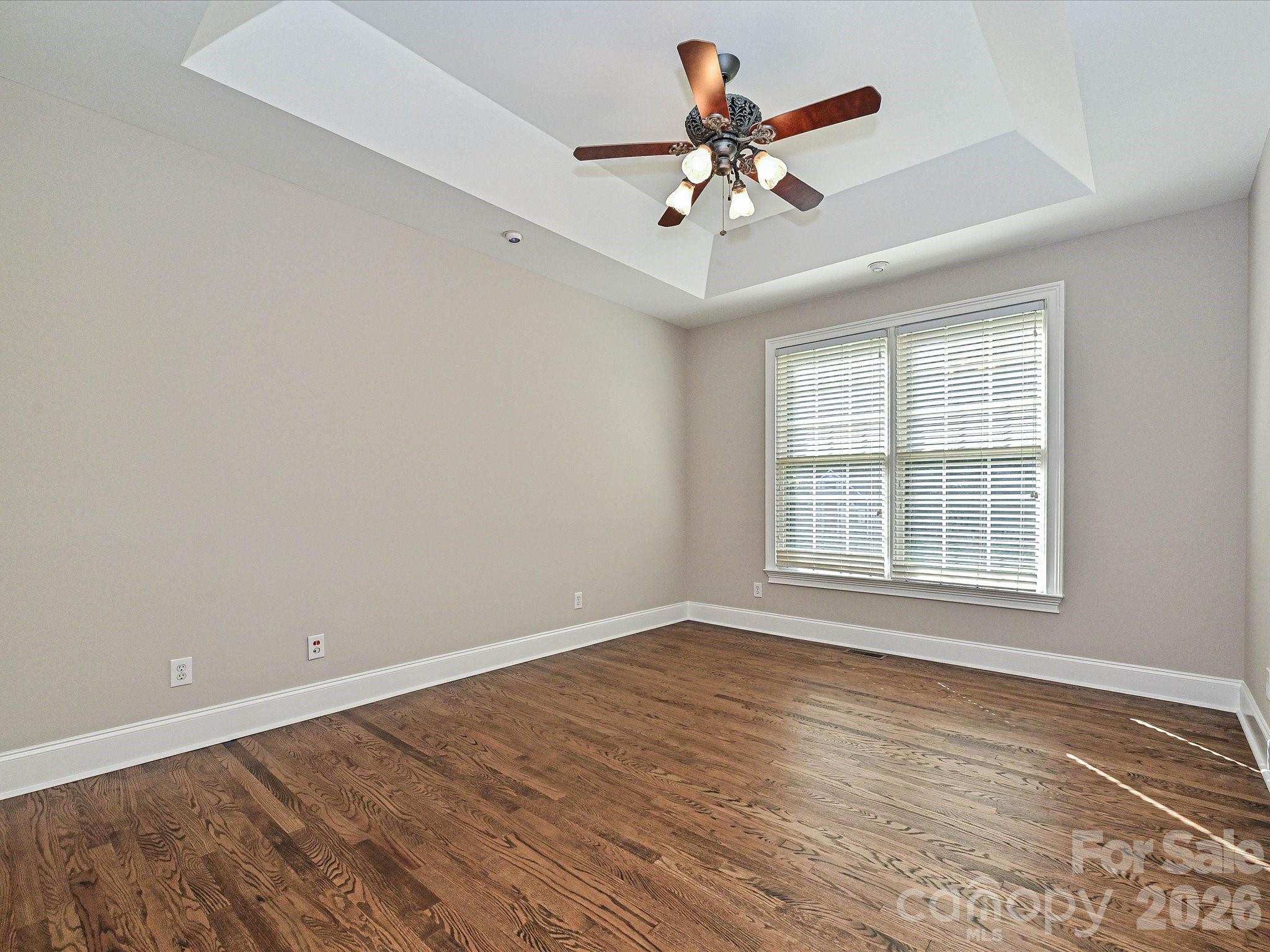 Primary bedroom with tray ceiling - 2354 Perry Road, Denver