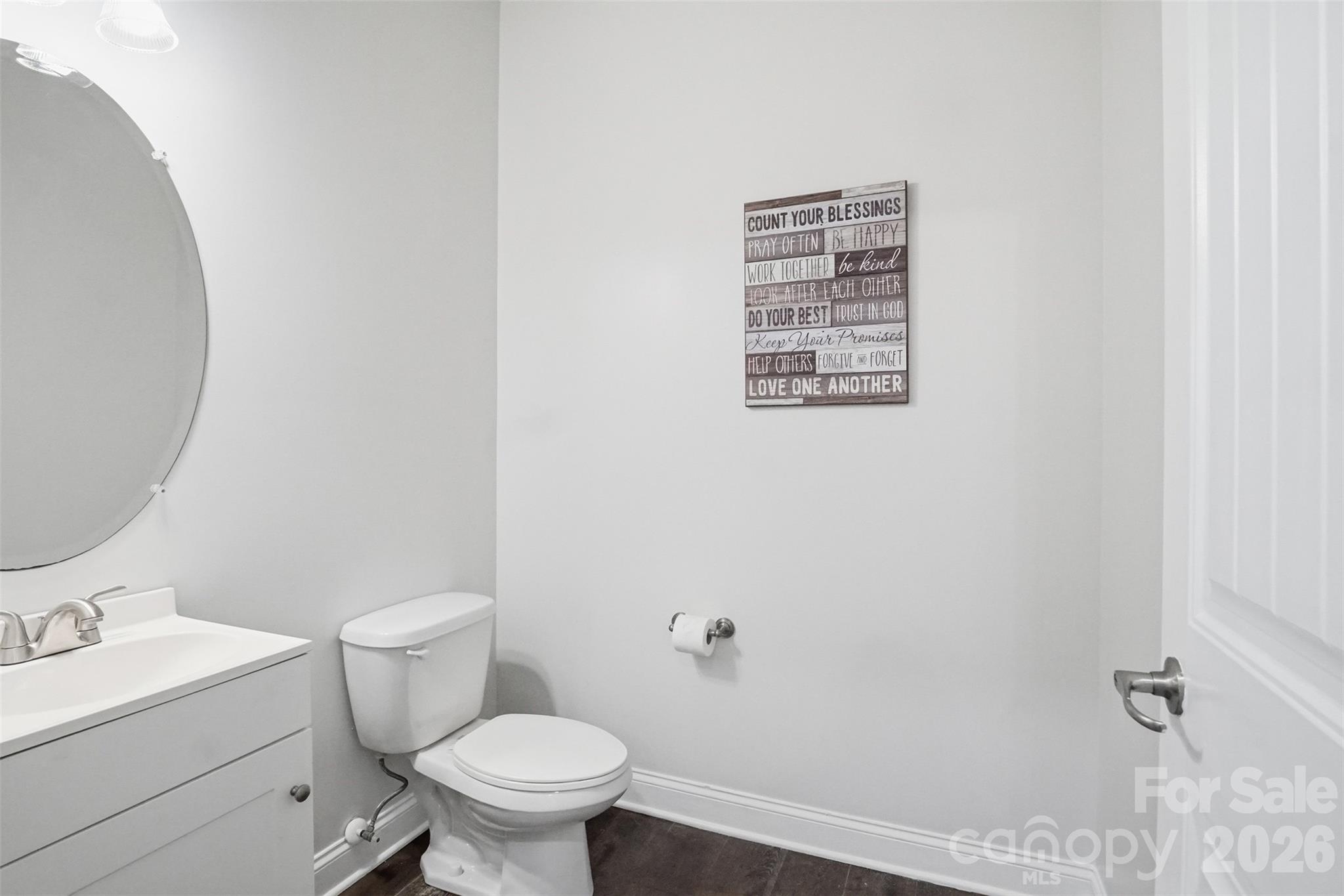 Half bath on main floor just inside the garage entry door for easy access! - 835 Estuary Court, Rock Hill