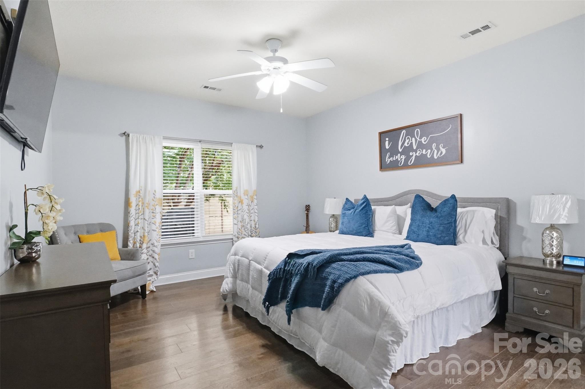 Primary bedroom on main with ceiling fan - 835 Estuary Court, Rock Hill