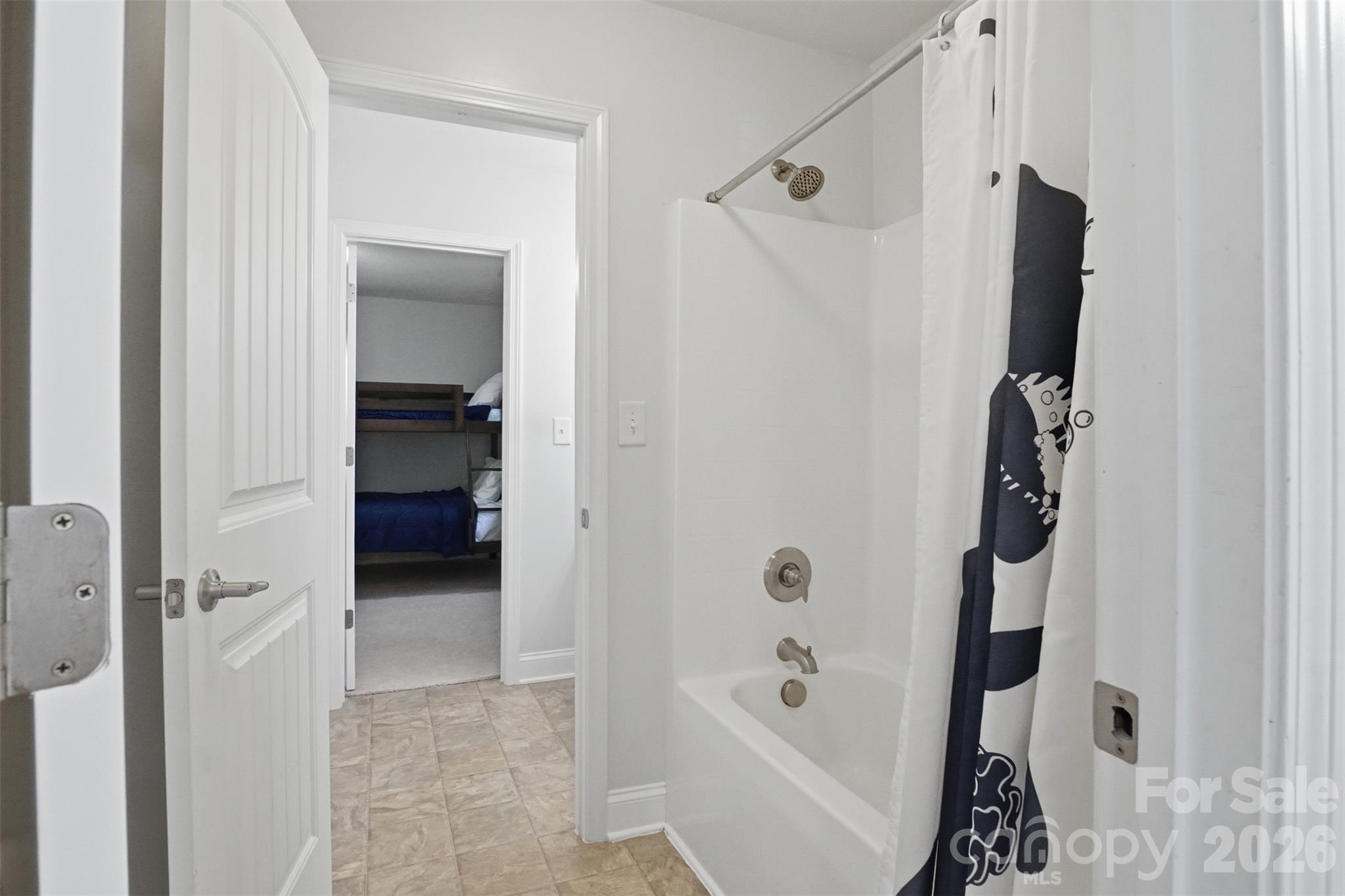 Shared shower/tub combo in the jack-n-jill bathroom - 835 Estuary Court, Rock Hill