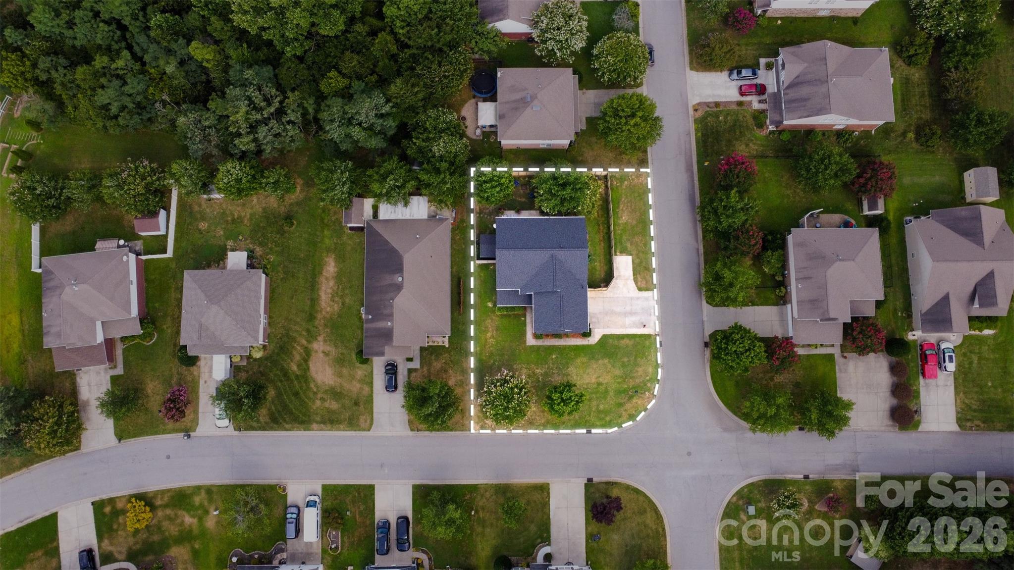 Corner lot with an extended driveway parking pad to keep extra vehicles out of the way of the garage parking. - 835 Estuary Court, Rock Hill