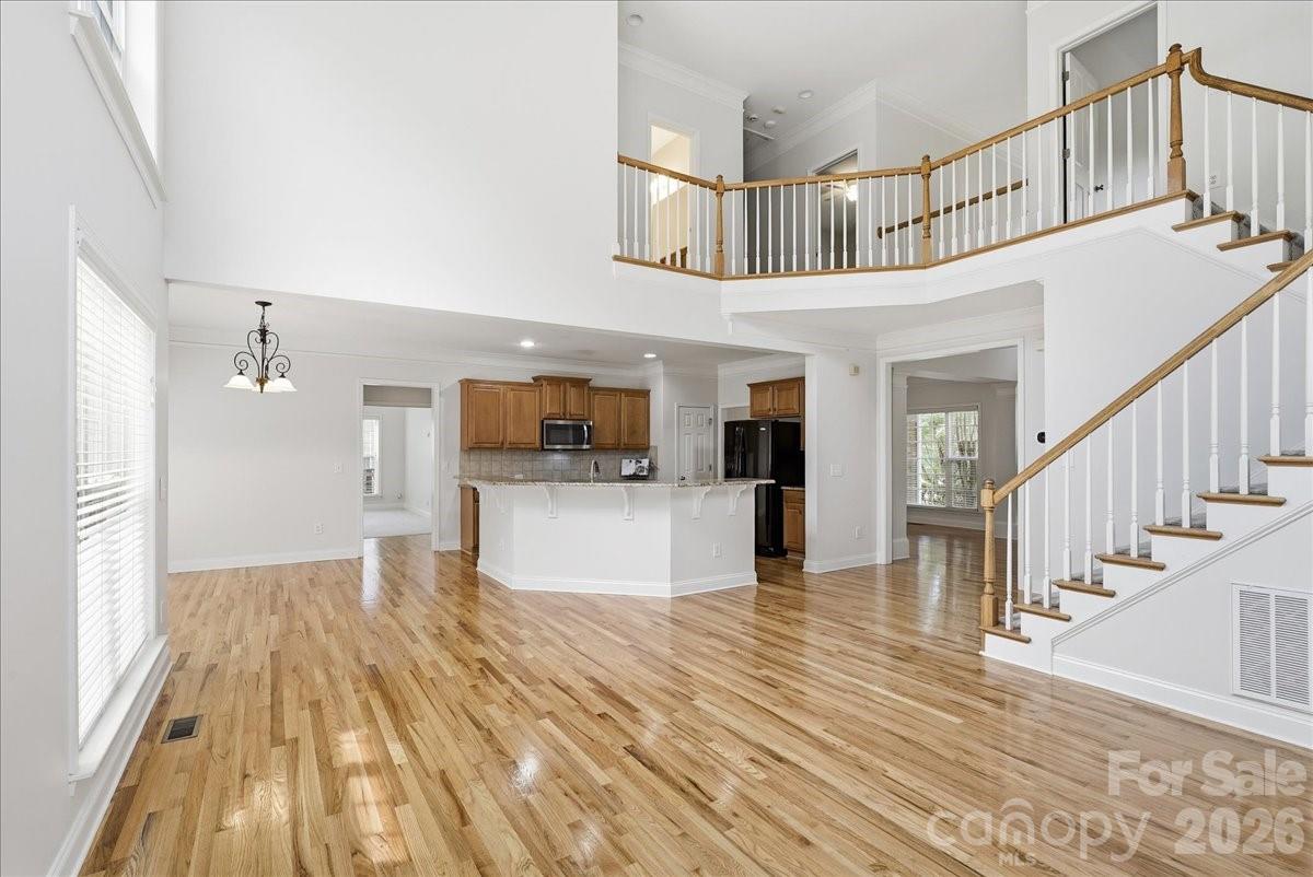 Great room looking into the kitchen - 6055 Latta Springs Circle, Huntersville