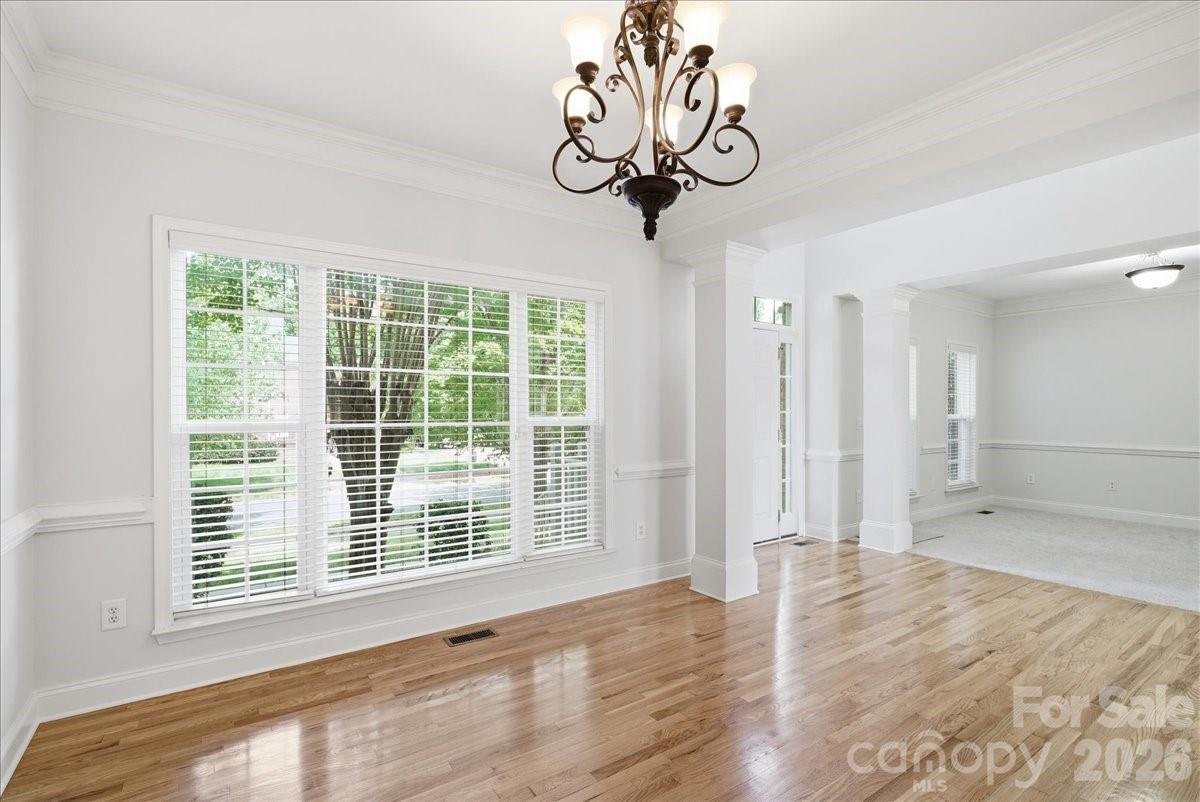 Dining room looking into living room - 6055 Latta Springs Circle, Huntersville