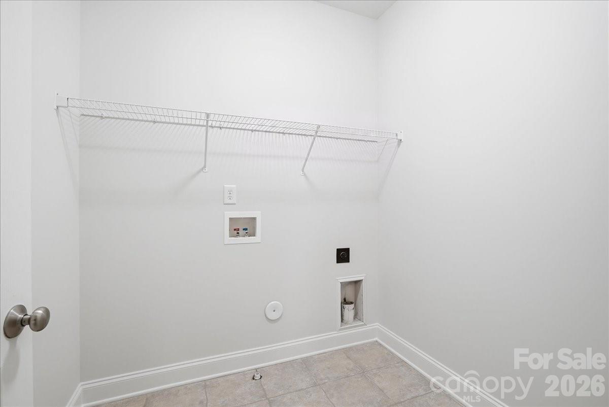 Upstairs laundry room - 6055 Latta Springs Circle, Huntersville