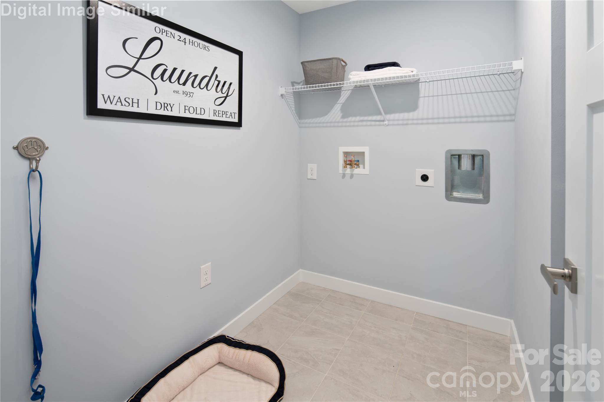 Convenient laundry room with space-saving design and the option to add a handy laundry tub. - 333 Linwood Estates Drive, Lexington