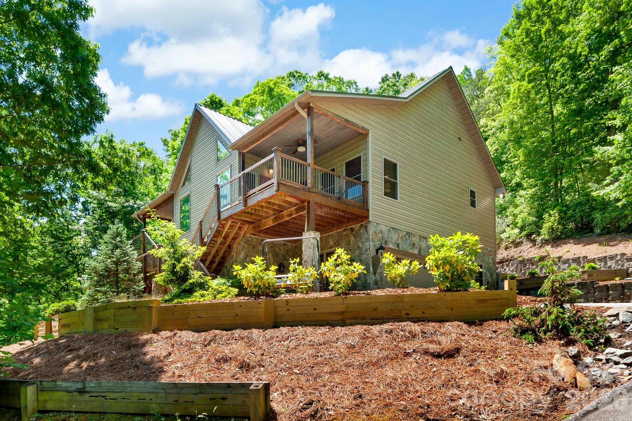 Front exterior view showing the approach to the home. - 179 Rock Spring Road, Lake Lure