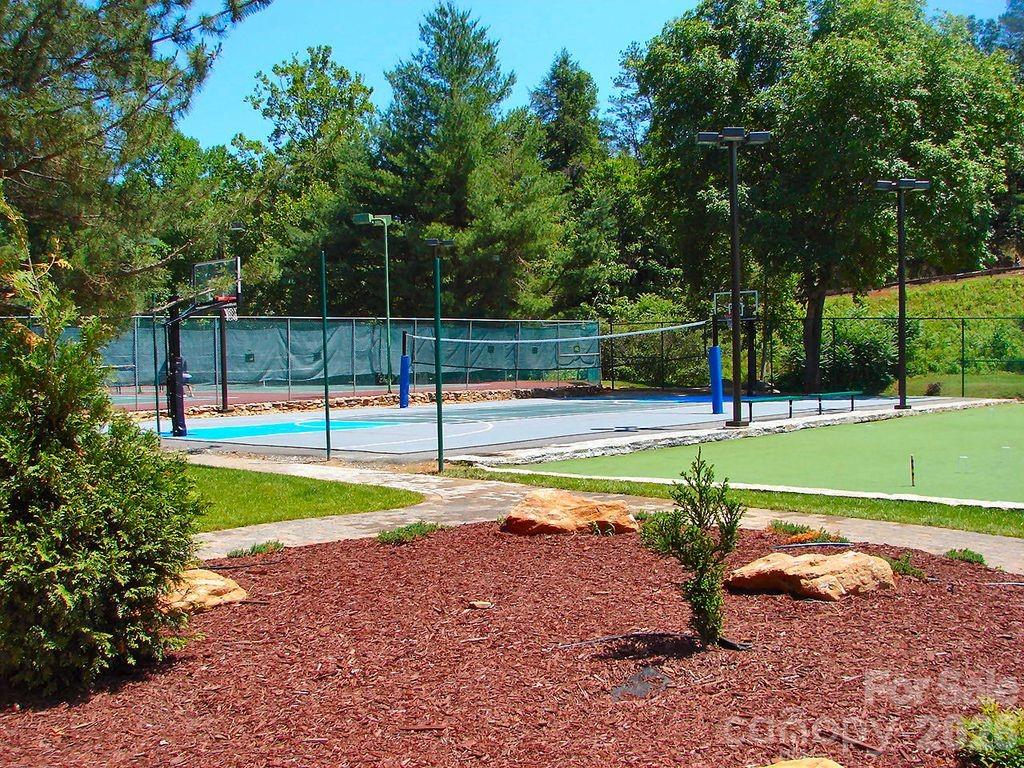 This property features extensive amenities at Rumbling Bald, offering a premier lifestyle experience. - 179 Rock Spring Road, Lake Lure