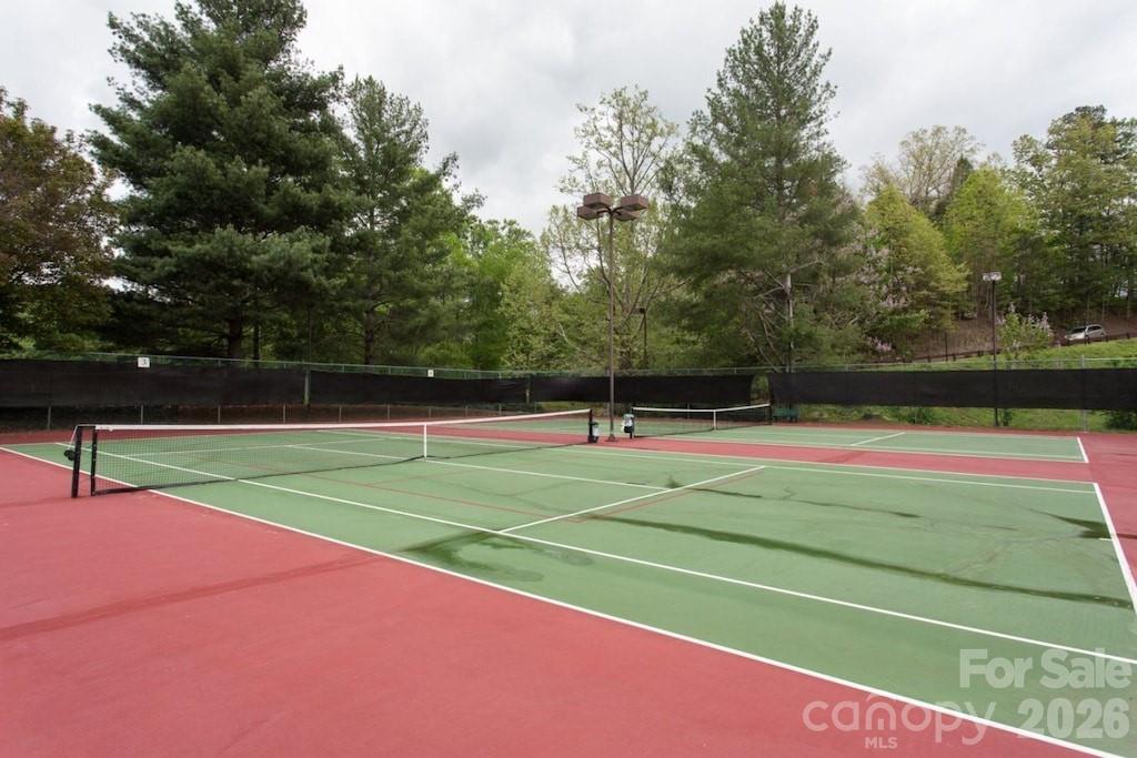 This property features extensive amenities at Rumbling Bald, offering a premier lifestyle experience. - 179 Rock Spring Road, Lake Lure