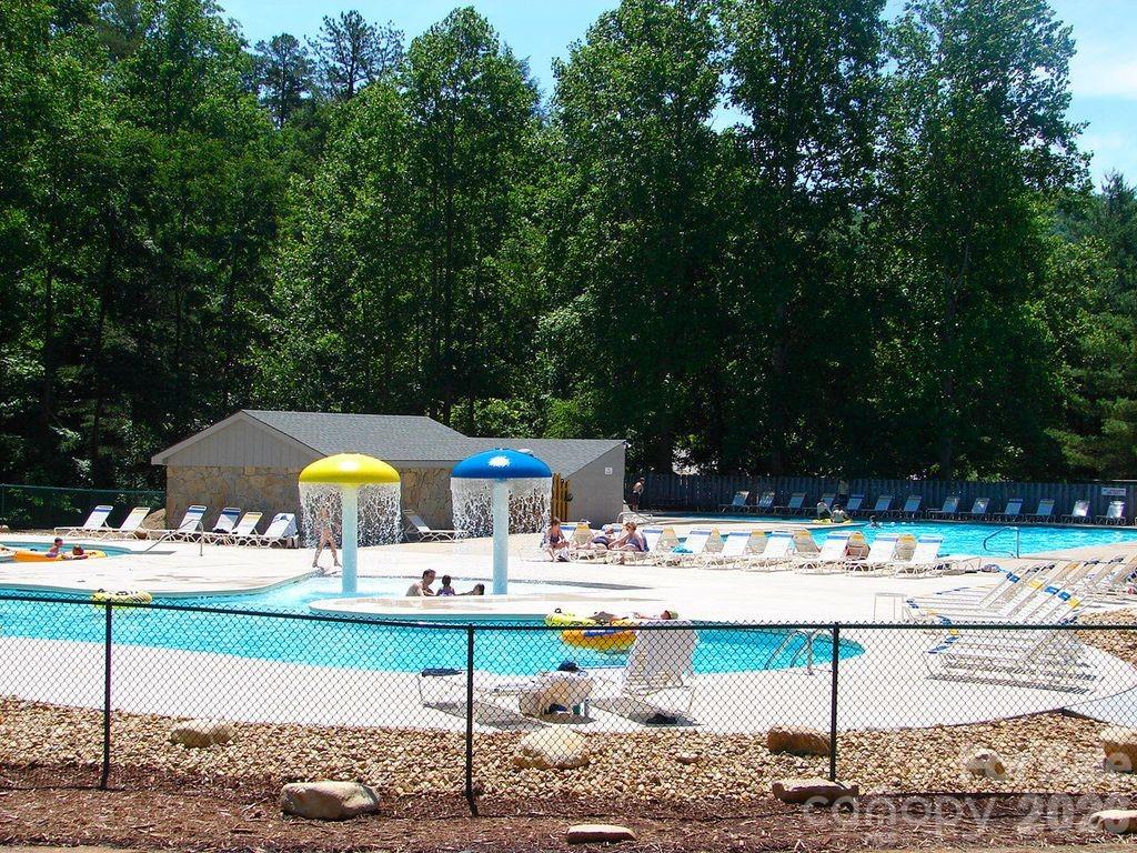 This property features extensive amenities at Rumbling Bald, offering a premier lifestyle experience. - 179 Rock Spring Road, Lake Lure