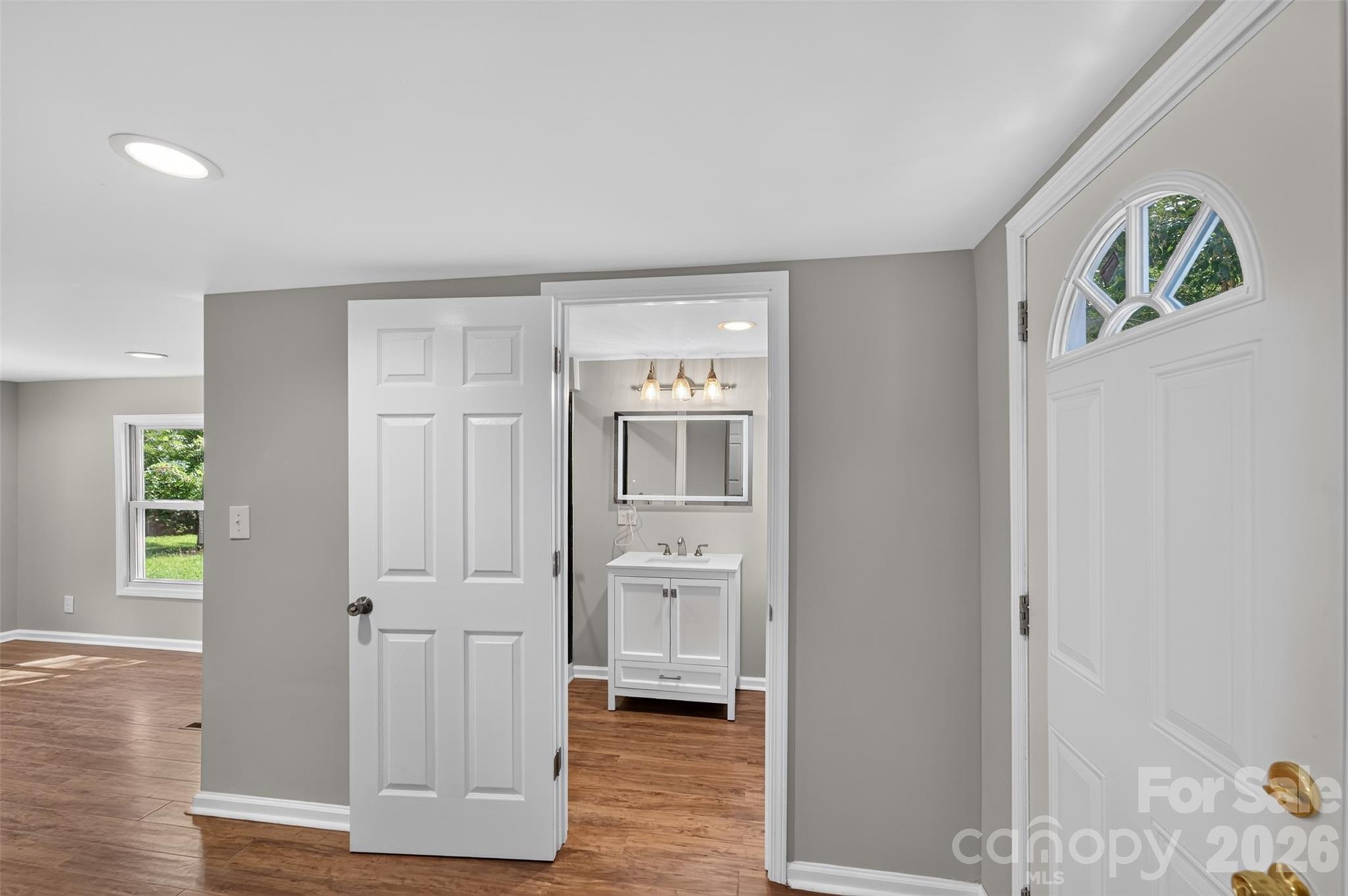 Exterior door to the back deck from the primary bedroom! - 620 10th Street Boulevard NW, Hickory