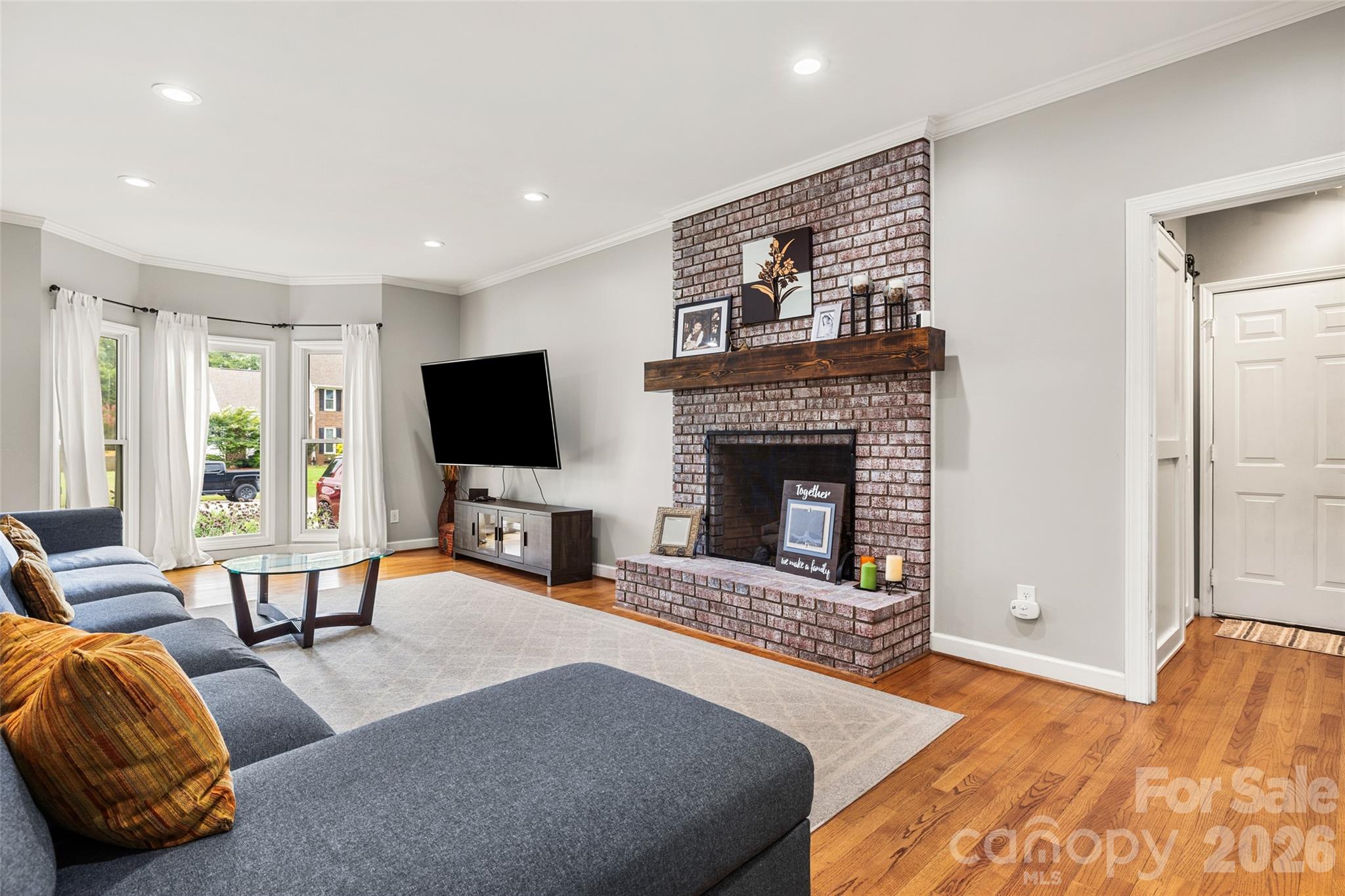 Cozy living room with fireplace - 3375 Blue Jay Pass, Fort Mill