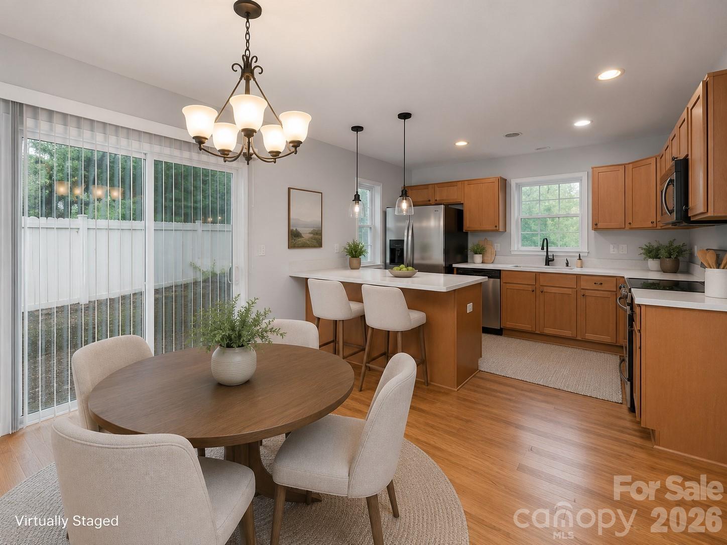 kitchen dining area virtually staged - 1929 Billingsville School Court, Charlotte