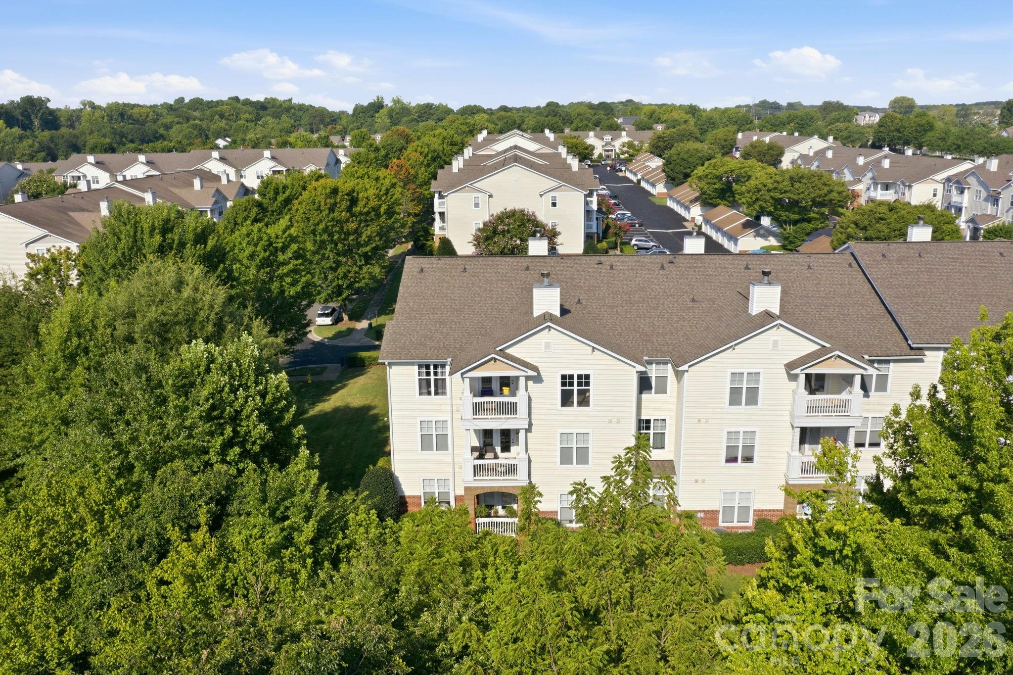 Top Floor Corner Unit surrounded by large, mature, trees - 17257 Doe Valley Court, Cornelius