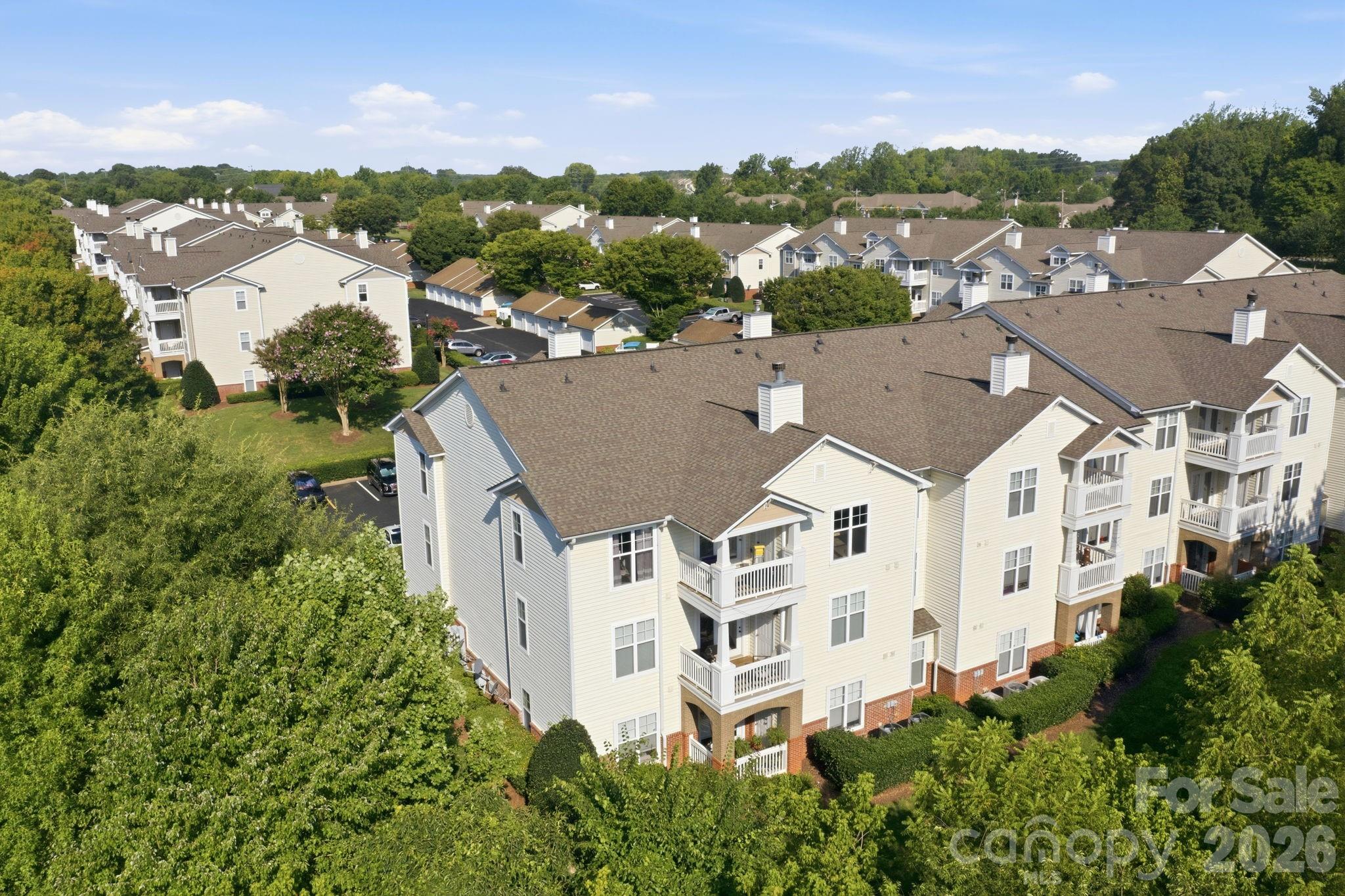 Top Floor Corner Unit surrounded by large, mature, trees - 17257 Doe Valley Court, Cornelius