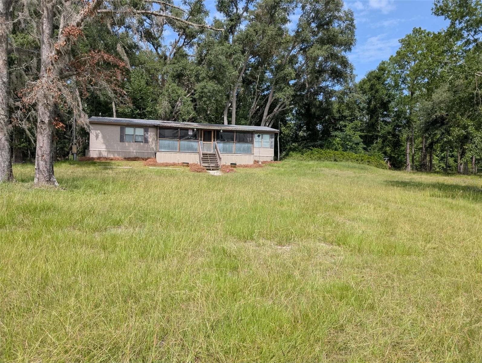Manufactured Home at 933 NE FIR ST, PINETTA, photo 4 of 20