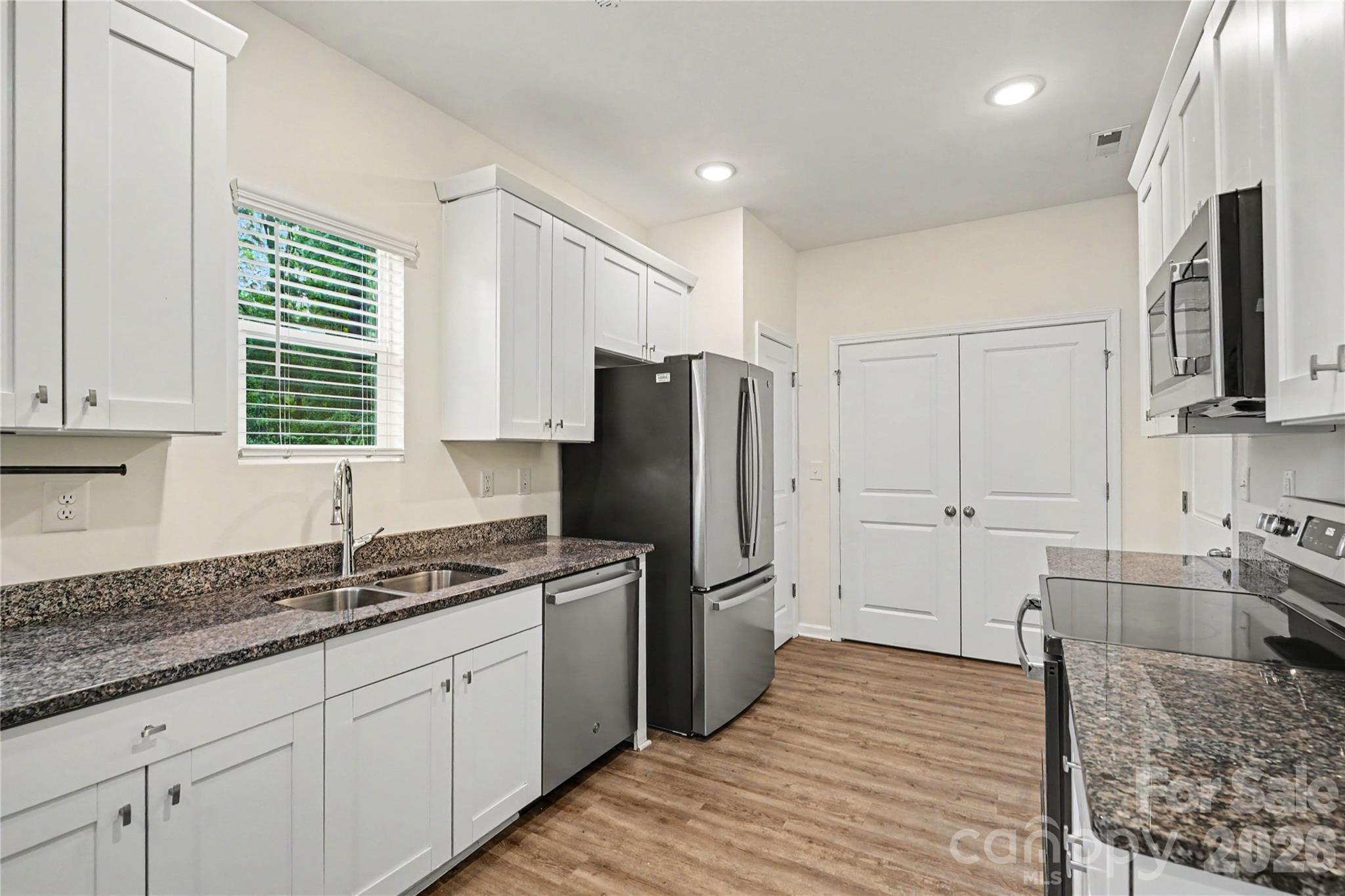 Kitchen with Granite Counters and Stainless Steel Appliances - 2231 Beauty Street, Statesville
