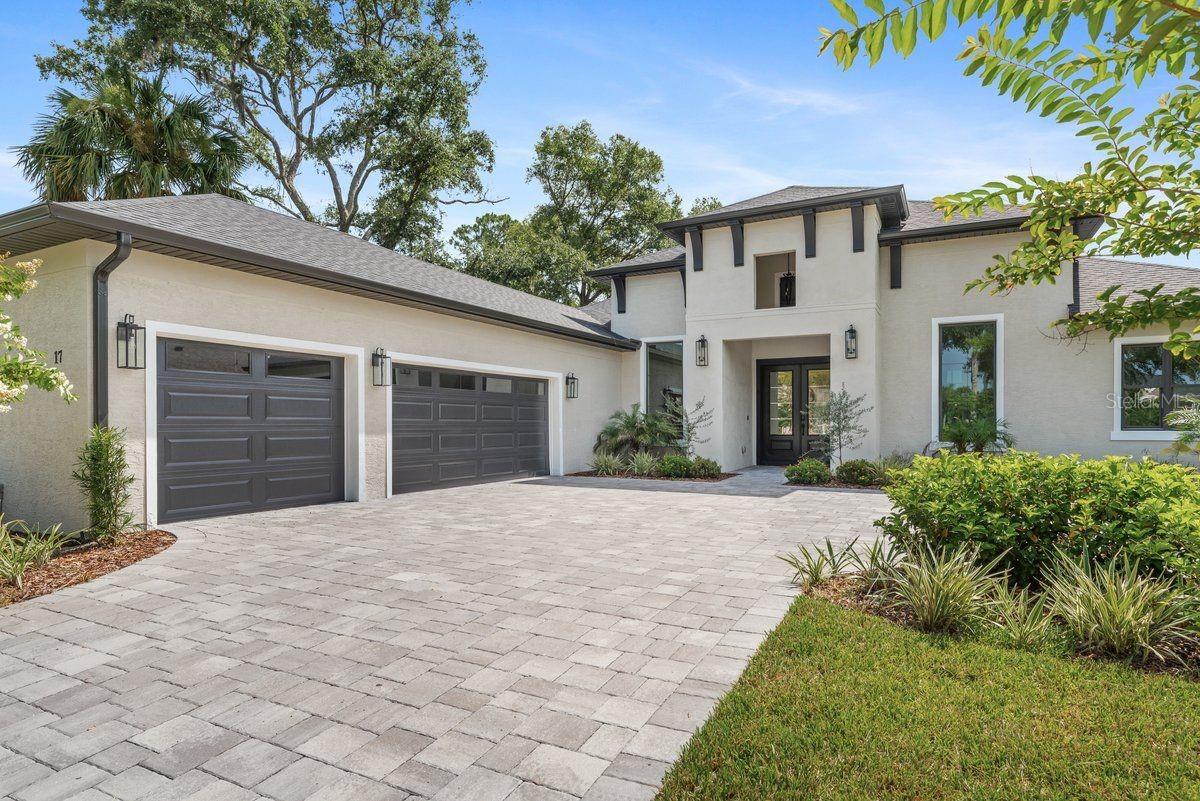 Courtyard Entry 3 Car Garage - 17 OLD OAK DR N, PALM COAST