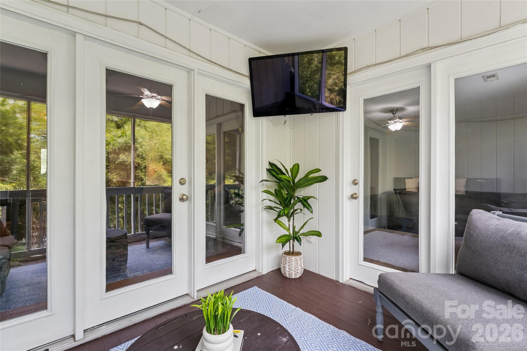 Outdoor space with mounted TV for outdoor entertainment - 1806 Fairlawn Court, Rock Hill