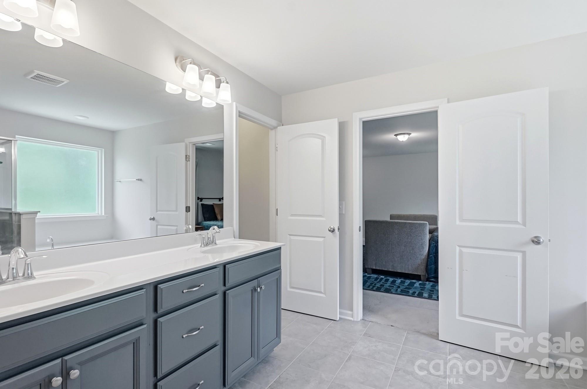 Primary Bath - Dedicated shower and large garden tub- 2nd floor - 9815 Caledenia Drive, Huntersville
