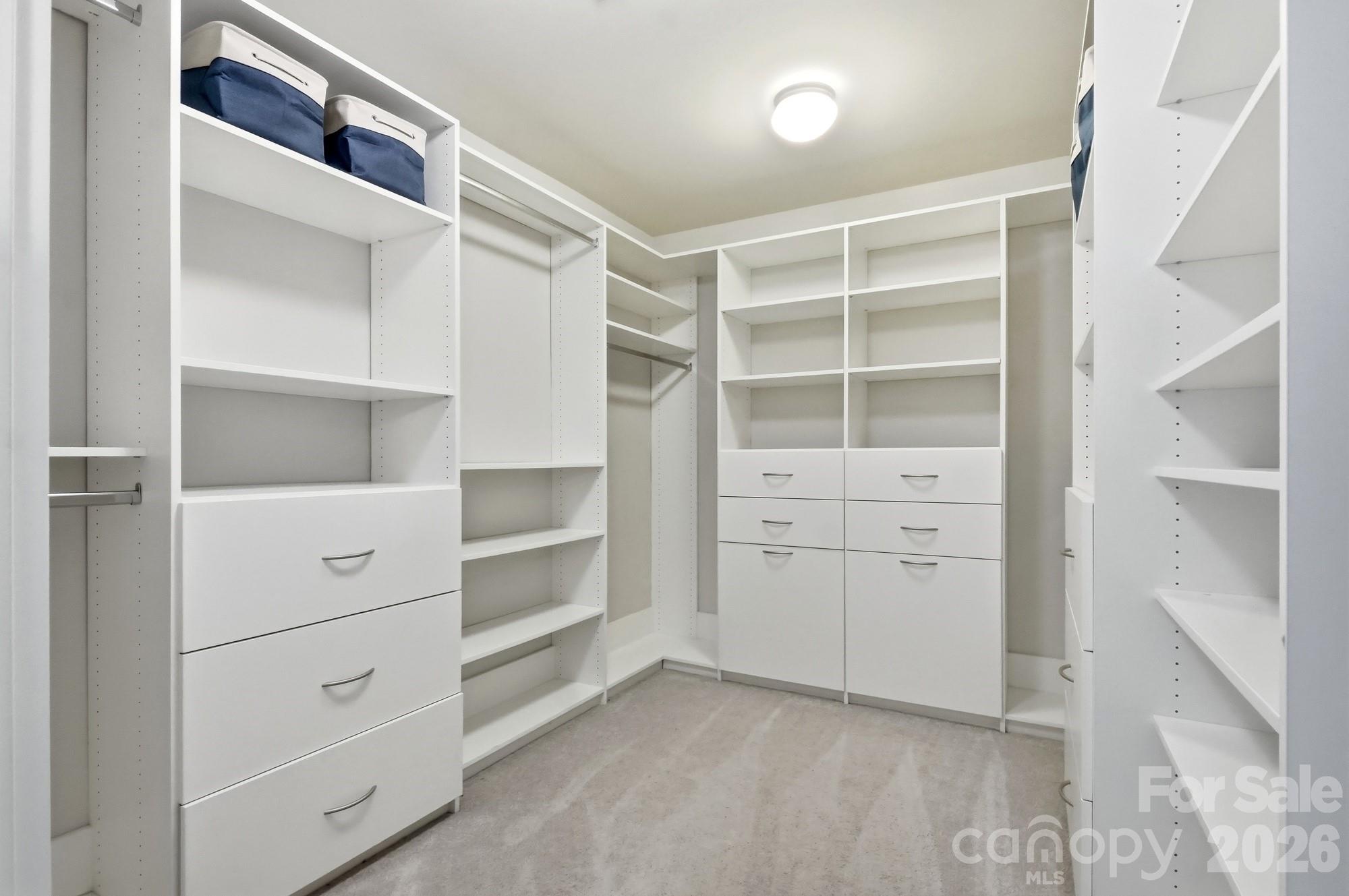 Primary custom walk-in closet - 2nd floor - 9815 Caledenia Drive, Huntersville