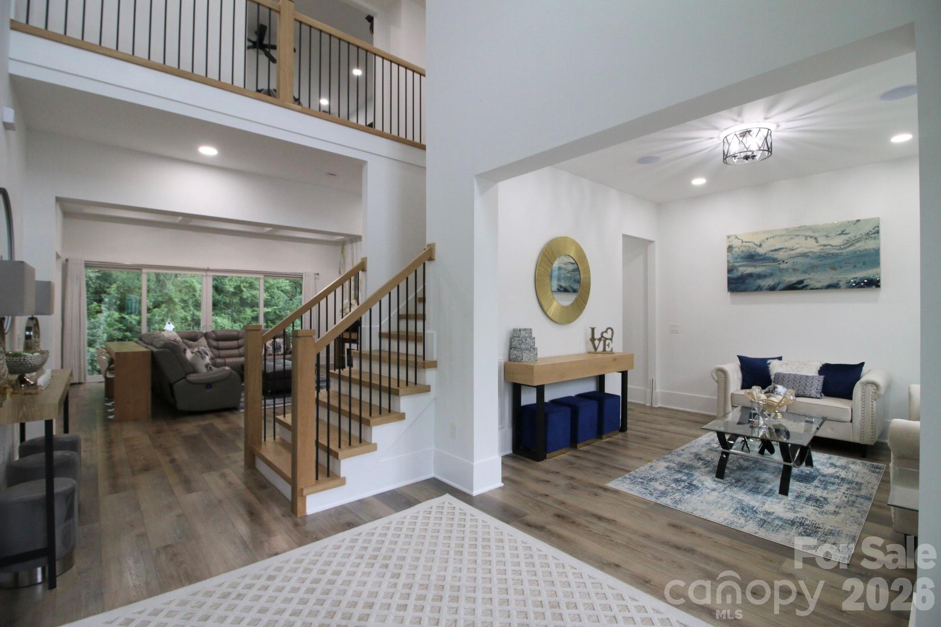 Entry foyer / Staircase (open to upper level) - 2916 Margaret Wallace Road, Matthews