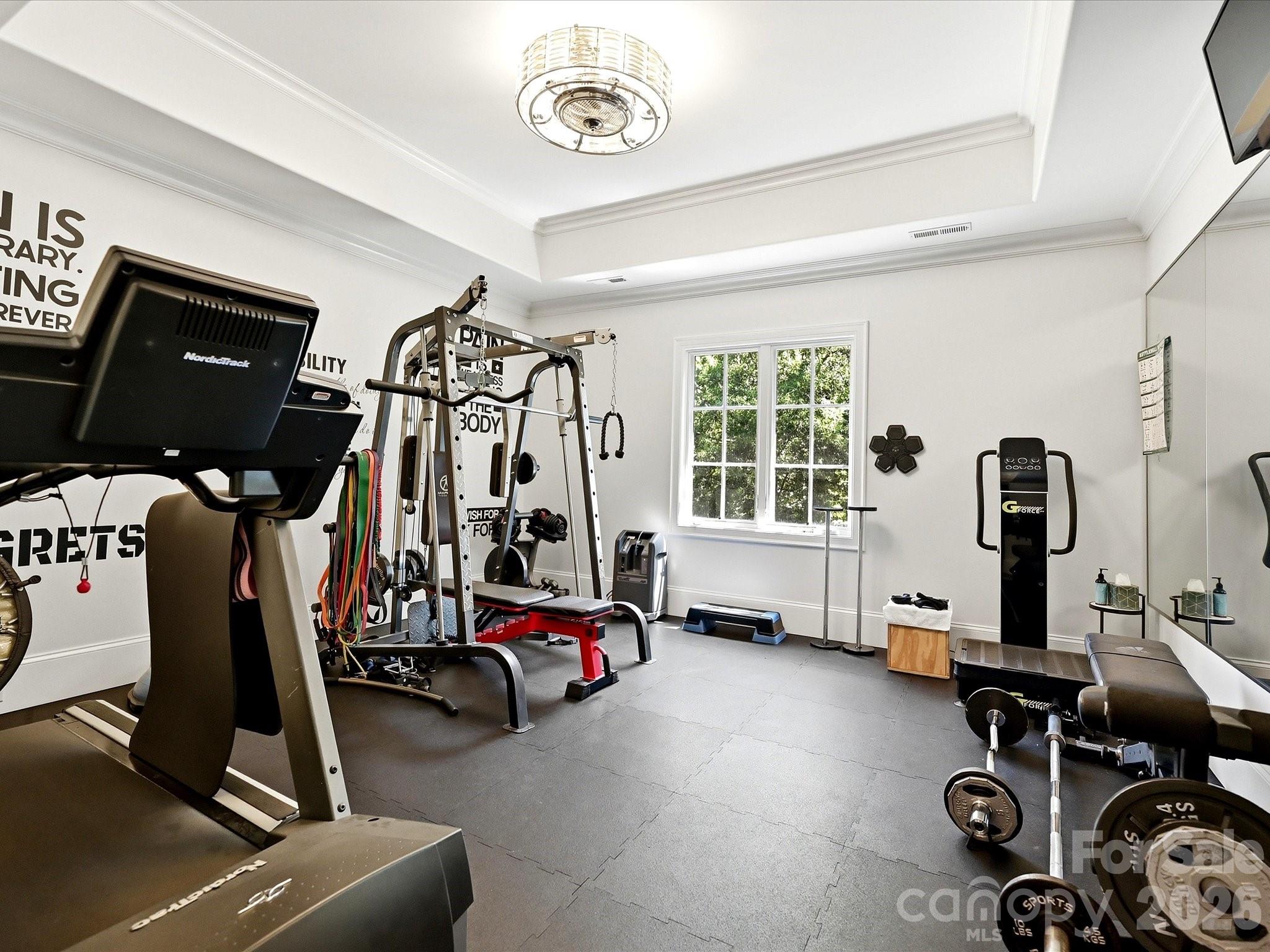 Upper Secondary Bedroom with large closet & private bathroom could be a second primary - currently used as a fitness studio - 2320 Brawinal Court, Monroe