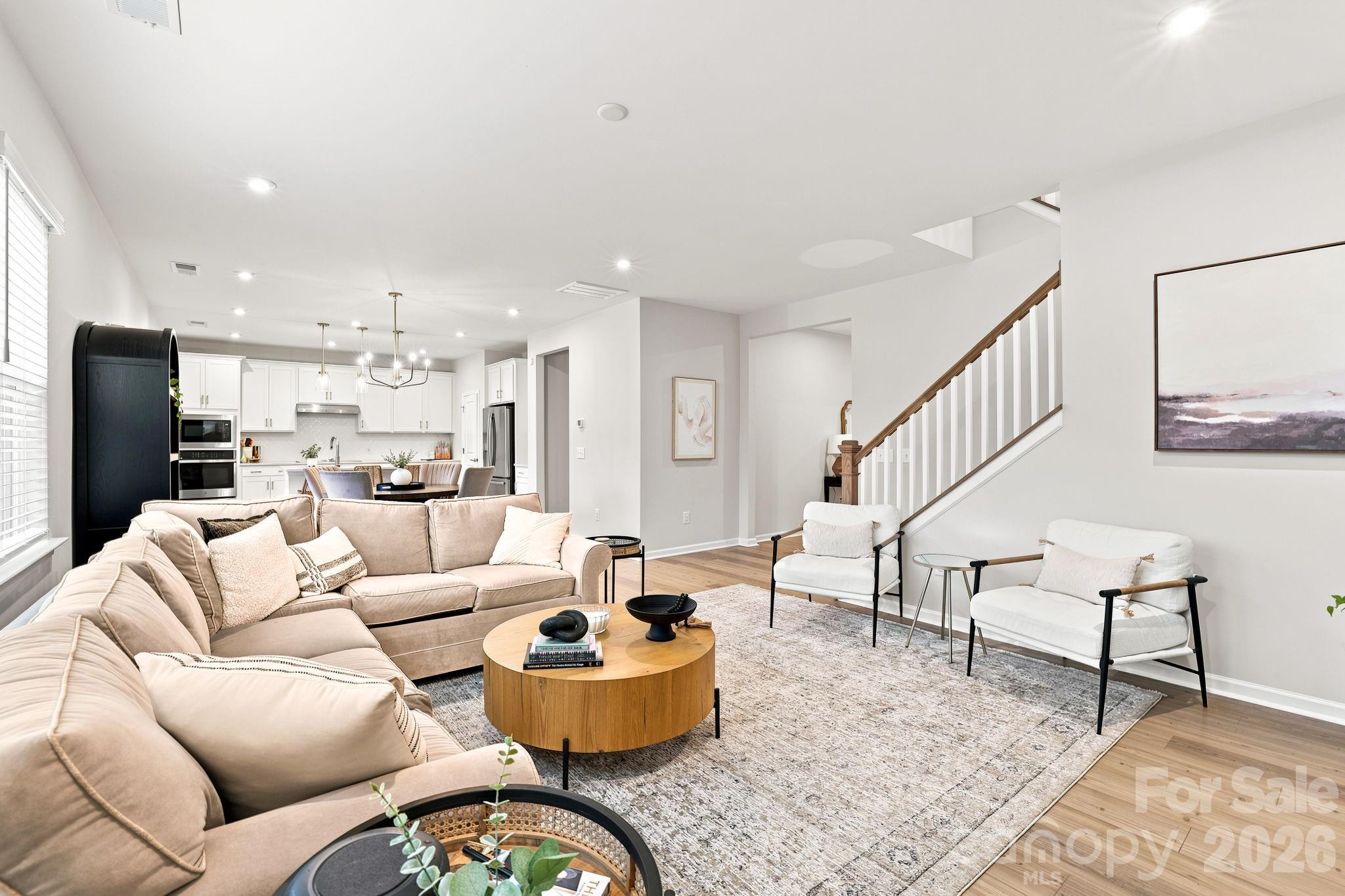 Family Room, Dining area, and Kitchen flow well for everyday living and entertaining - 8226 Franklin Trail Street, Mint Hill
