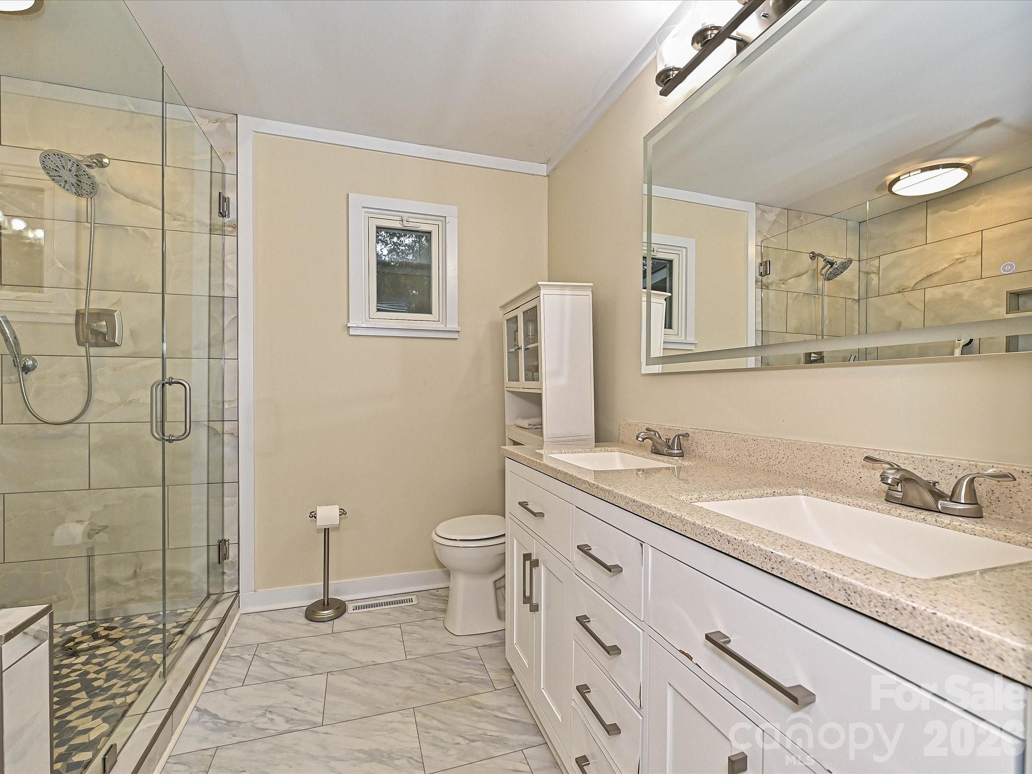 Primary Bath with step in shower with custom tile - 3115 Potter Road S, Waxhaw