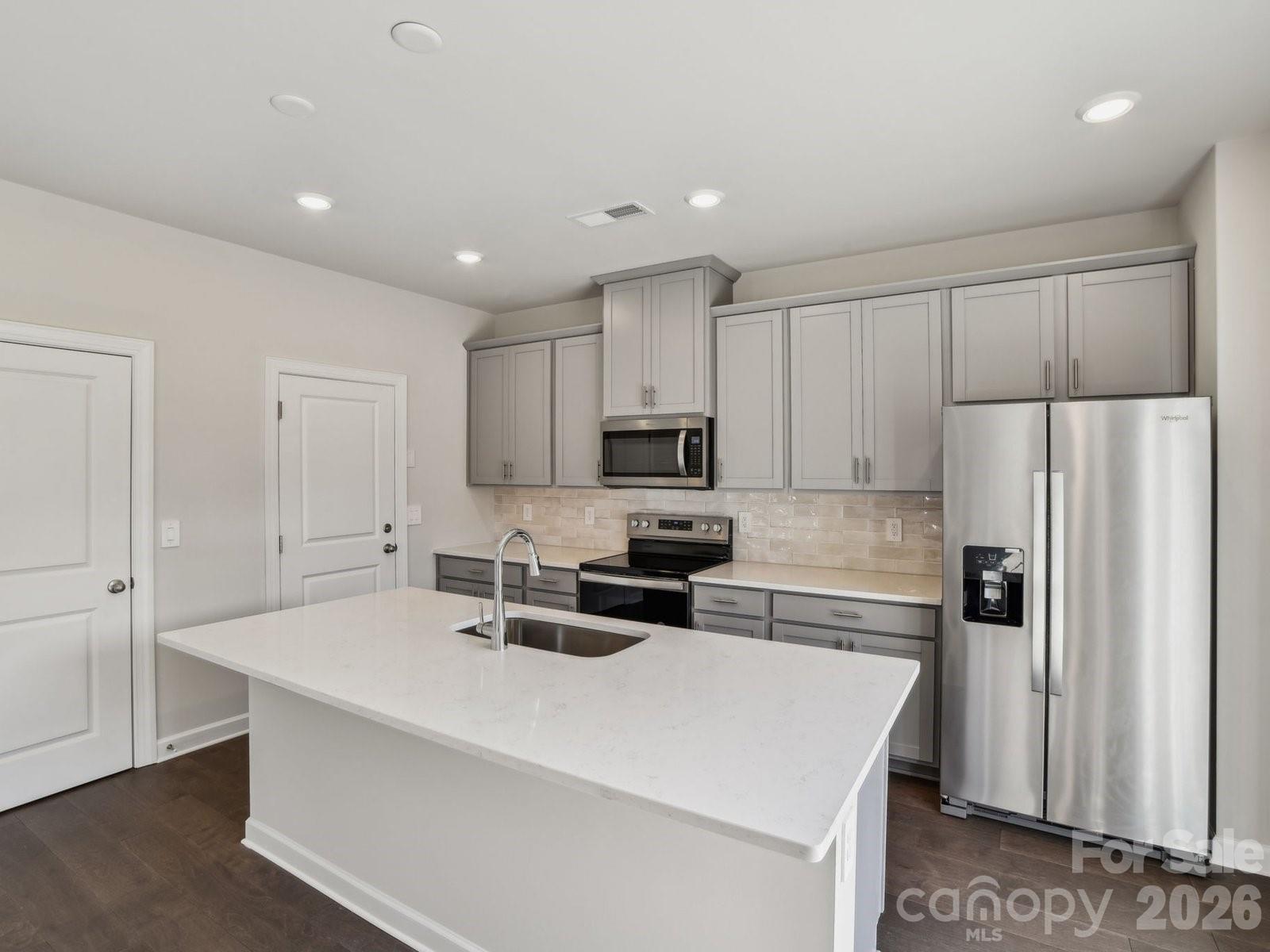 Photos are not of the actual home, but are photos of the builder home with same floorplan - 5056 Poplin Valley, Cherryville