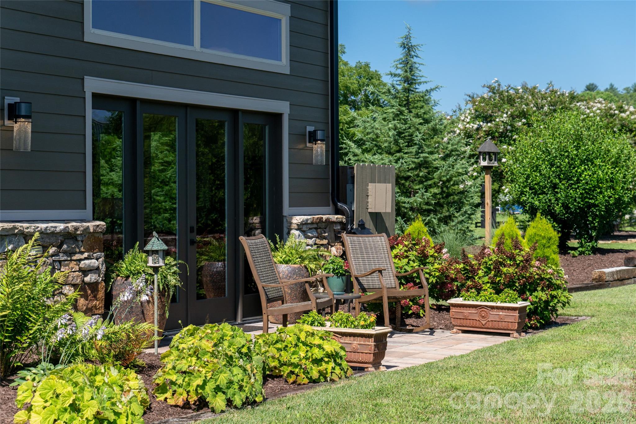 Patio off primary bedroom. - 660 Pleasant Grove Road, Hendersonville