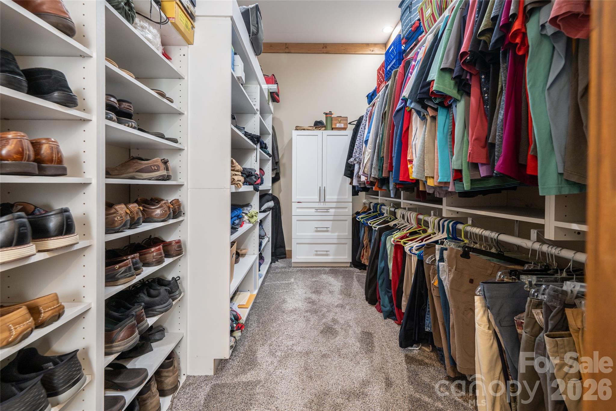 HIS walk-in closet. - 660 Pleasant Grove Road, Hendersonville