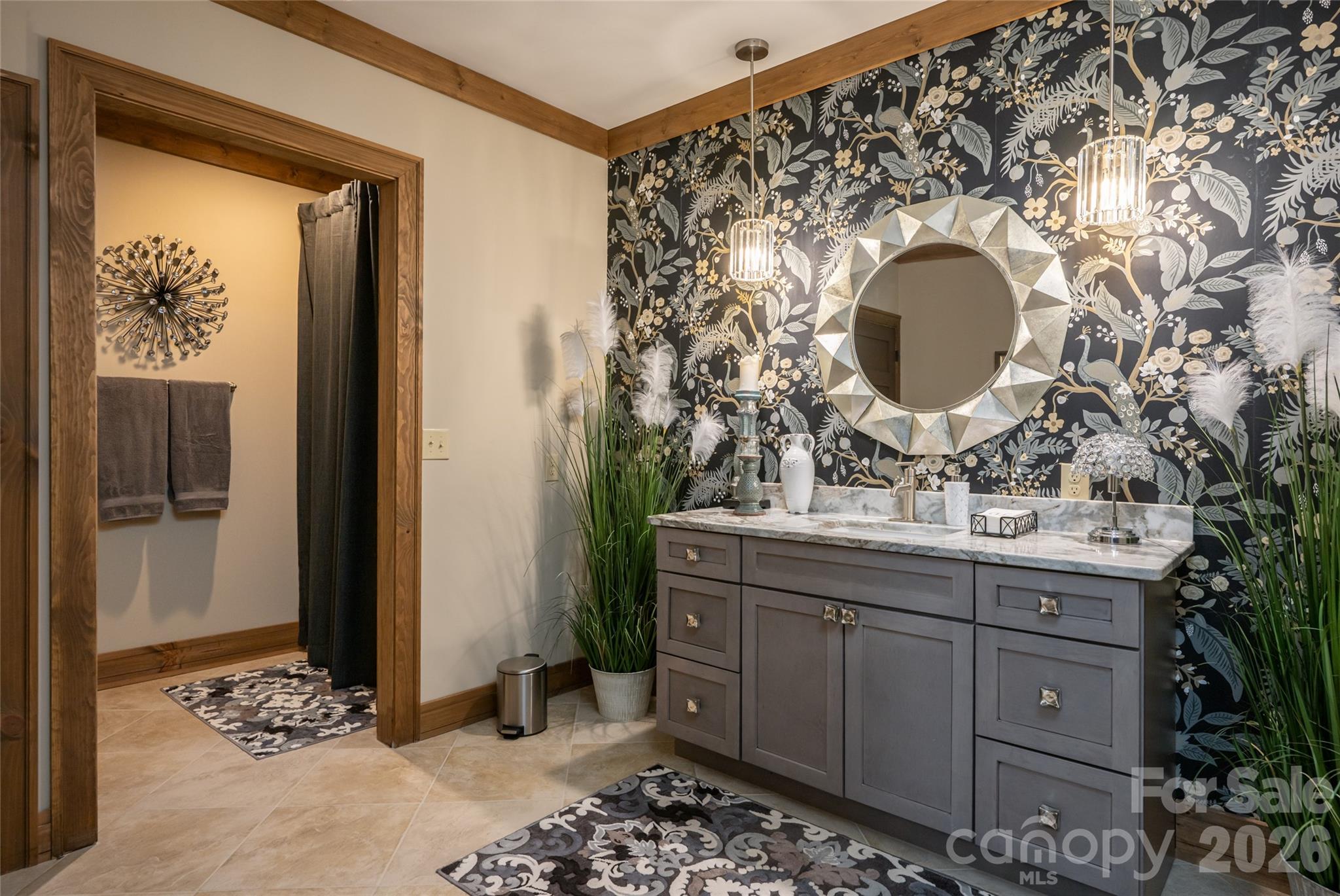 Spacious guest bathroom with tub/shower combination and private toilet room. - 660 Pleasant Grove Road, Hendersonville