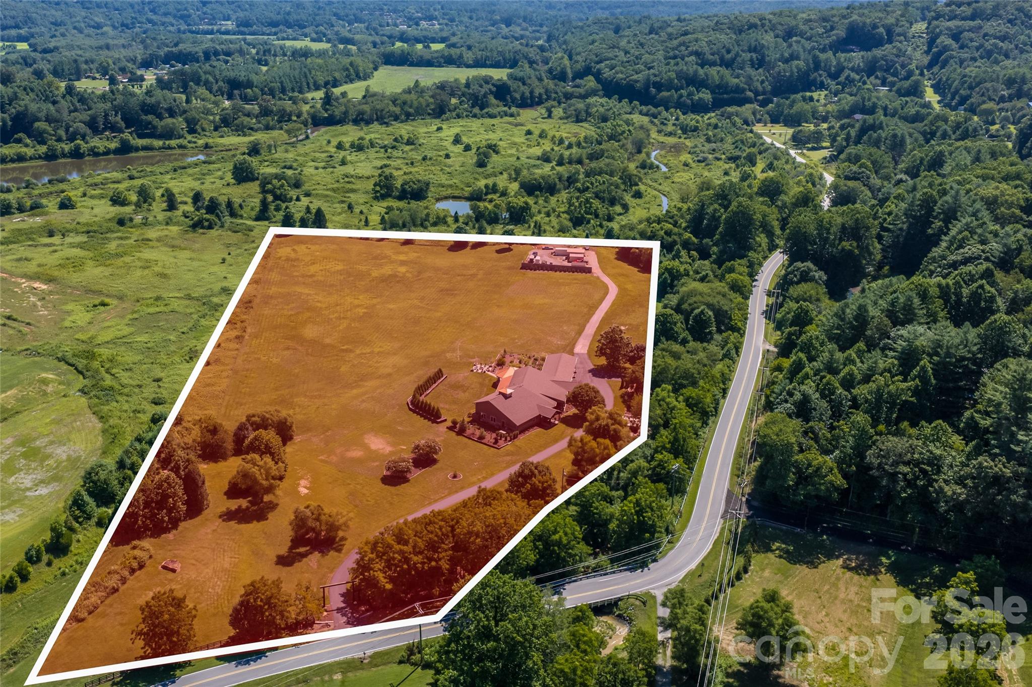 Aerial showing the GIS property lines. - 660 Pleasant Grove Road, Hendersonville