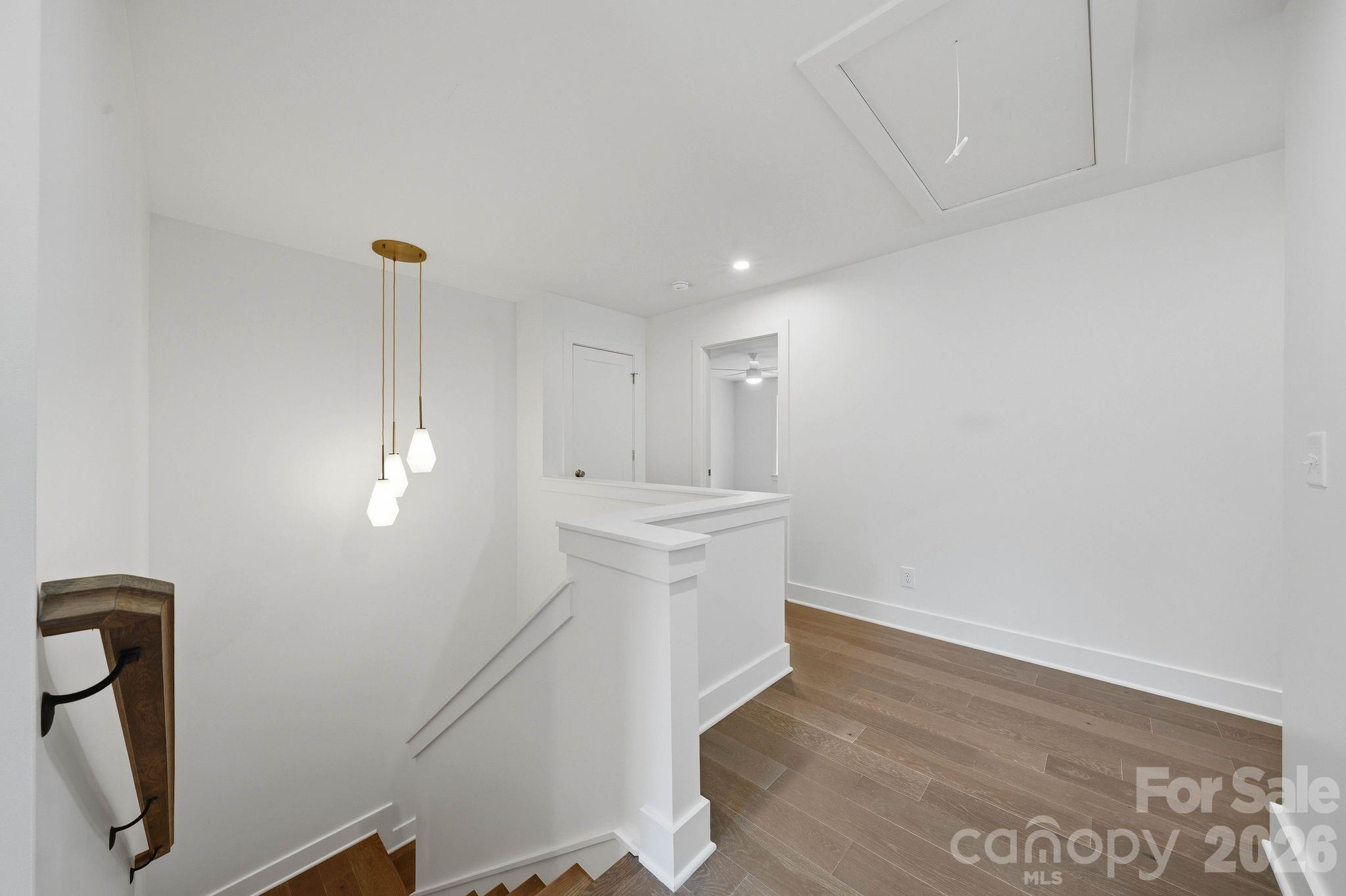 Upper level landing. - 2311 Chateau Court, Matthews