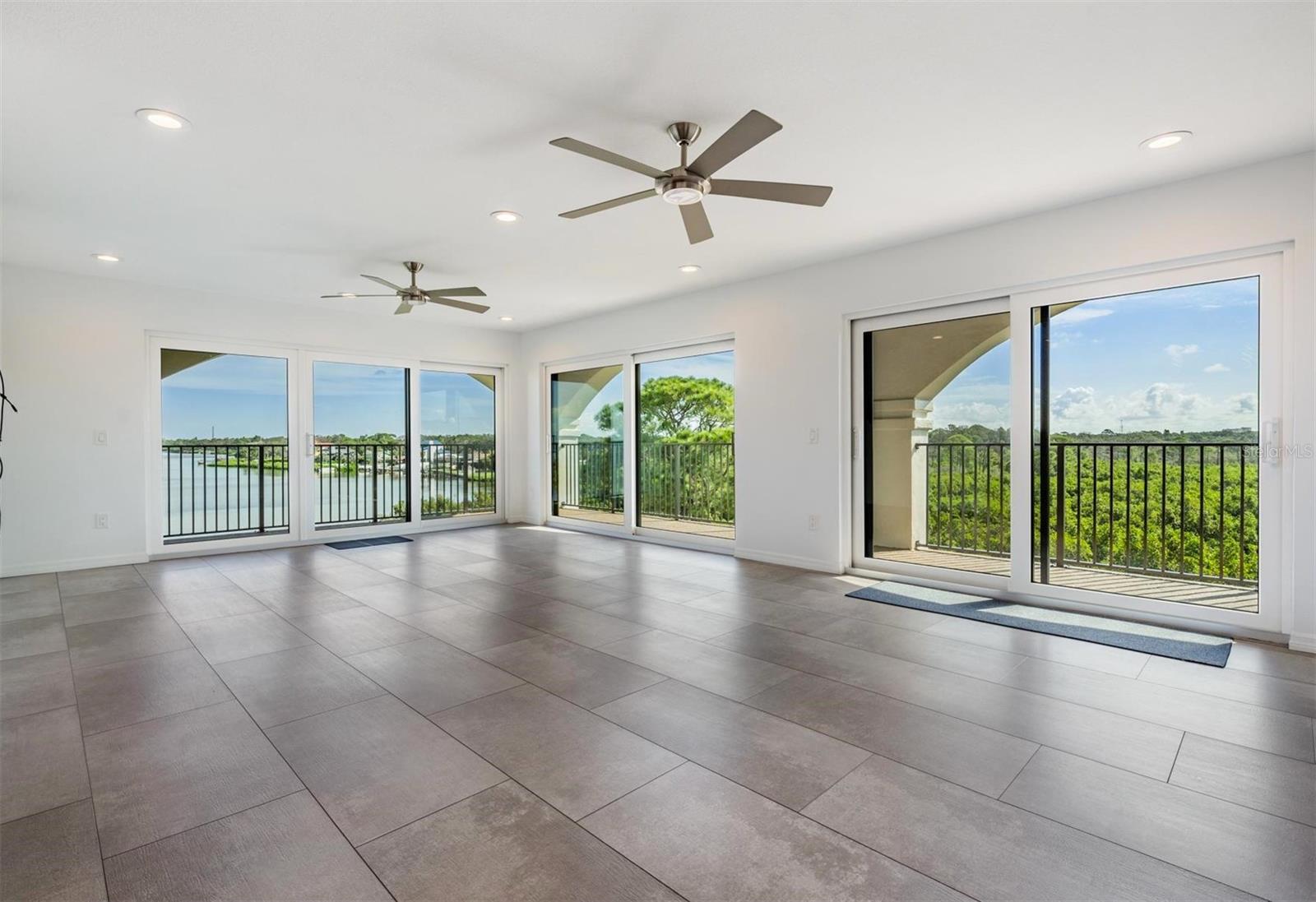 Living Room with Gorgeous Views of The Gulf and Preserve - 243 MARINER DR #243, TARPON SPRINGS