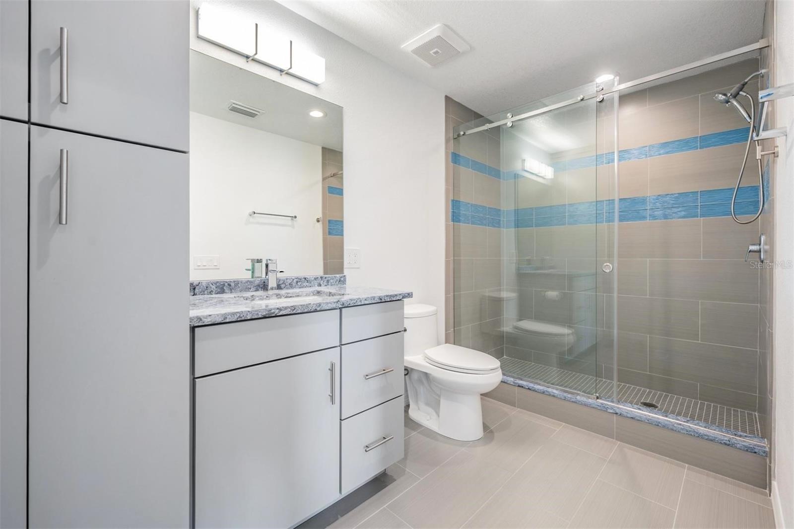 Master #1 Bathroom with Large Shower and Extra Storage - 243 MARINER DR #243, TARPON SPRINGS