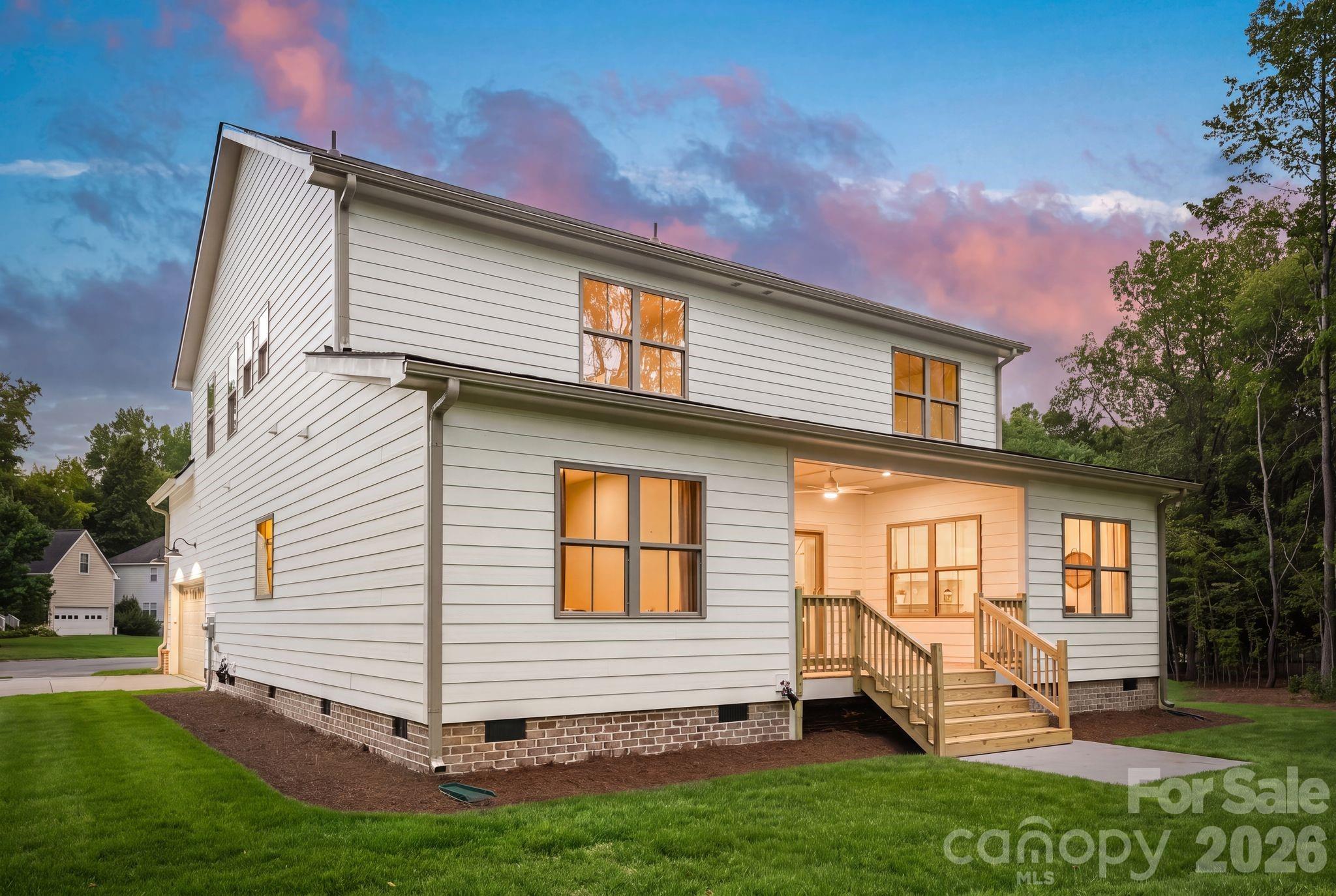 Exterior side view at twilight. - 2315 Chateau Court, Matthews