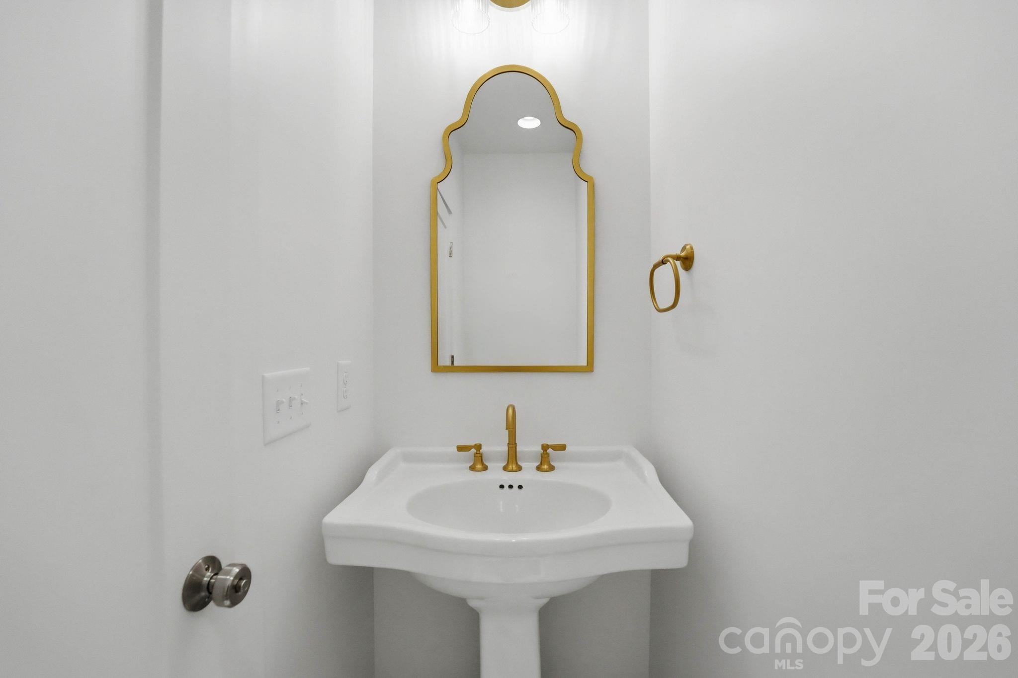 Powder room. - 2315 Chateau Court, Matthews