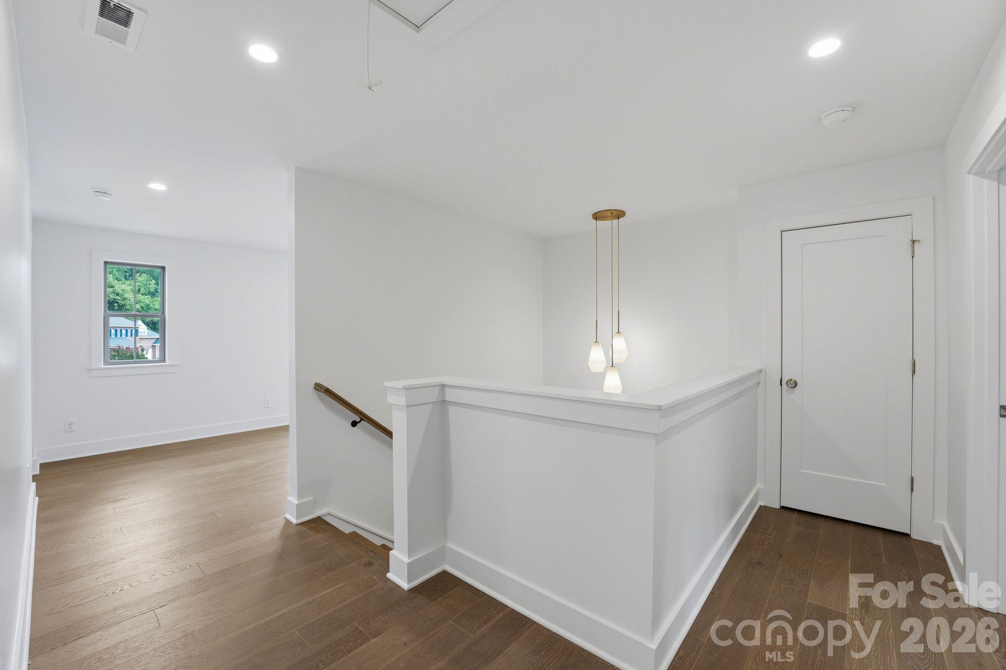 Upper level landing. - 2315 Chateau Court, Matthews